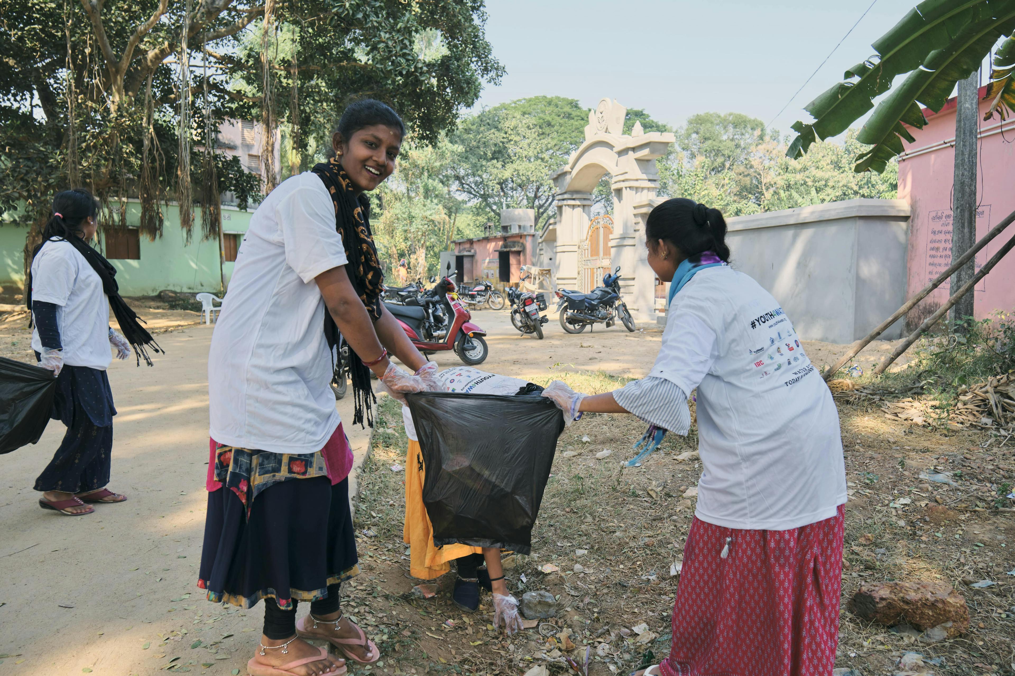 Health & Medicine- Volunteers of Bharat Gyan Vigyan Samiti and Sattvic Soul Foundation engage in a village cleanup/ plogging activity in Shankarpur, Dhenkanal district.