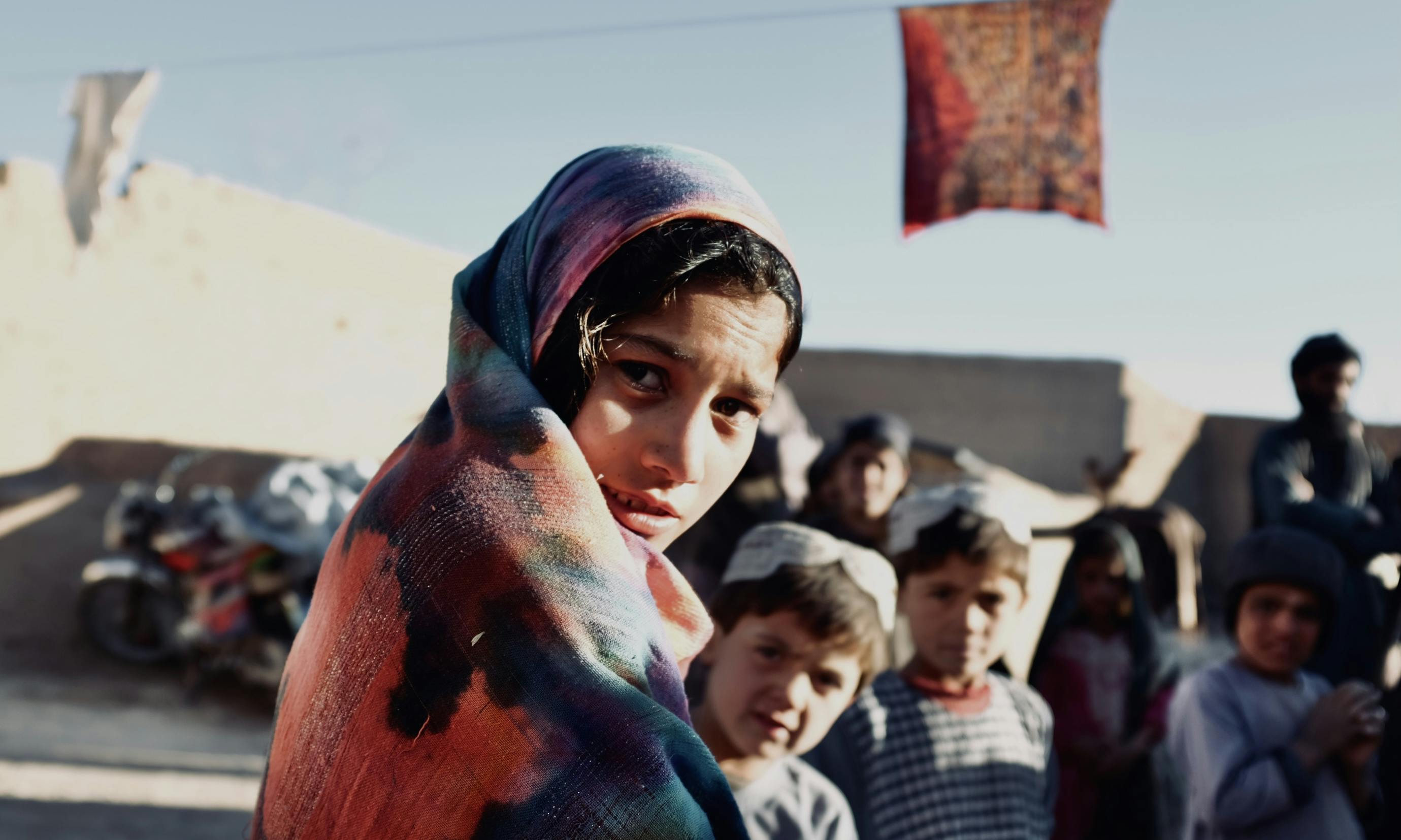 10 year old Peri-Gul inside a communal housing unit where latrines are being built in Sola Village, Tarinkot District.