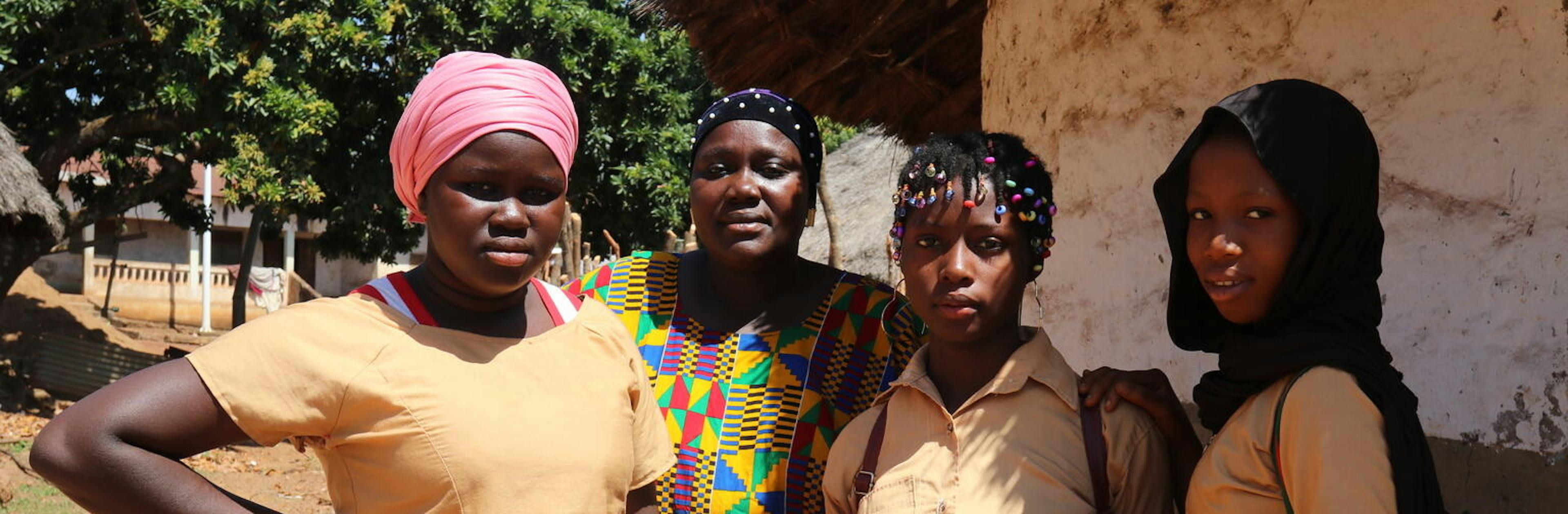 4 African girls standing togetherr