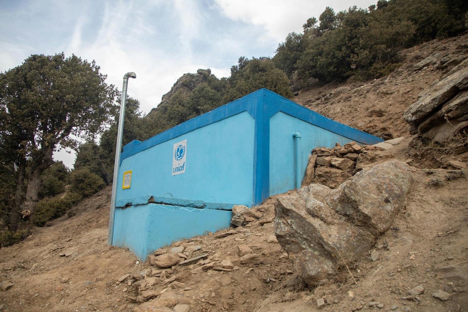 A lifetime of water - water reservoirs feed gravity flow systems, holding enough water for each person in the village to use 40 litres a day.