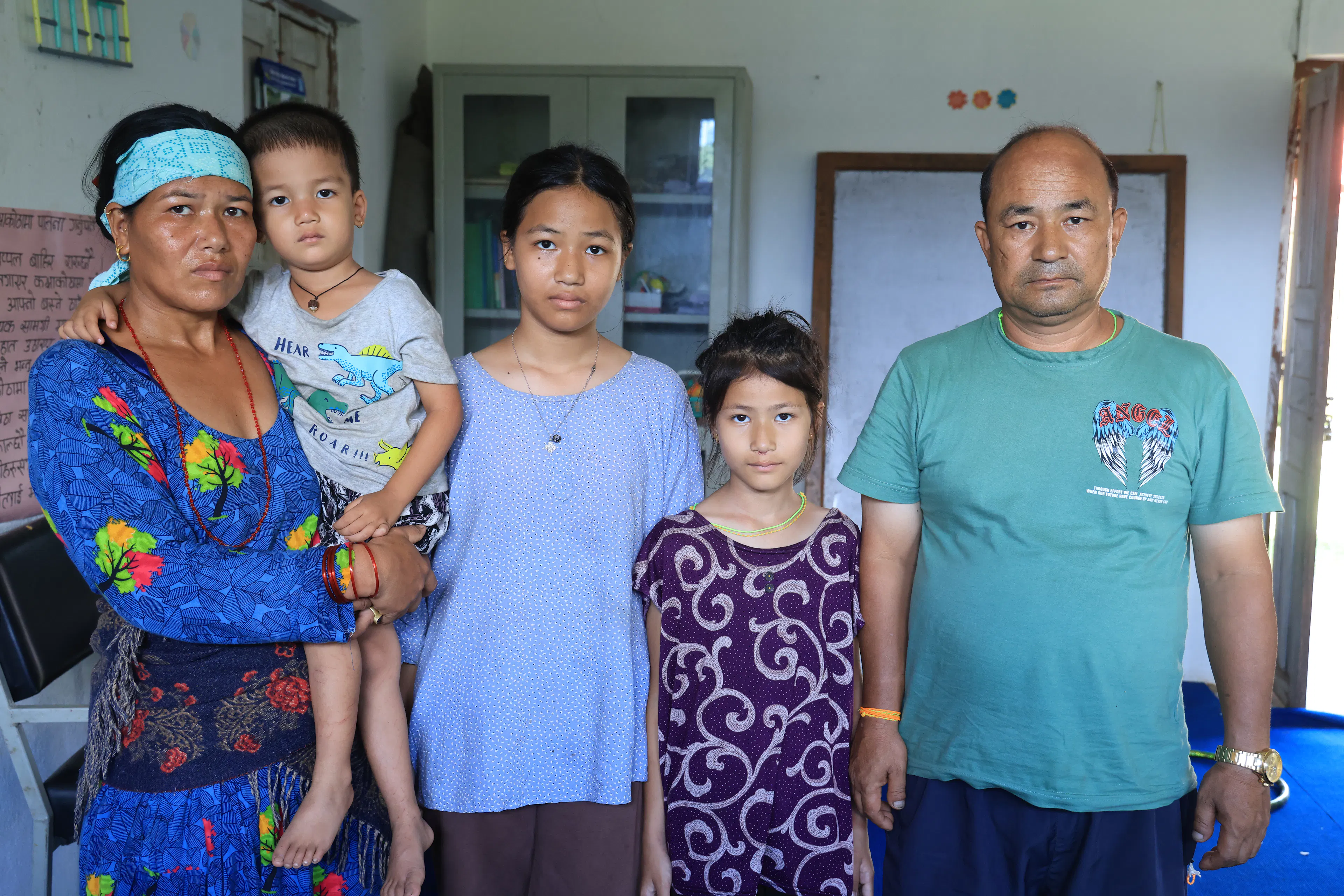 A family displaced by flooding in Nepal