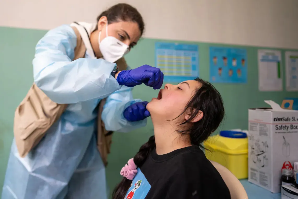 A child in Lebanon receiving a vaccine
