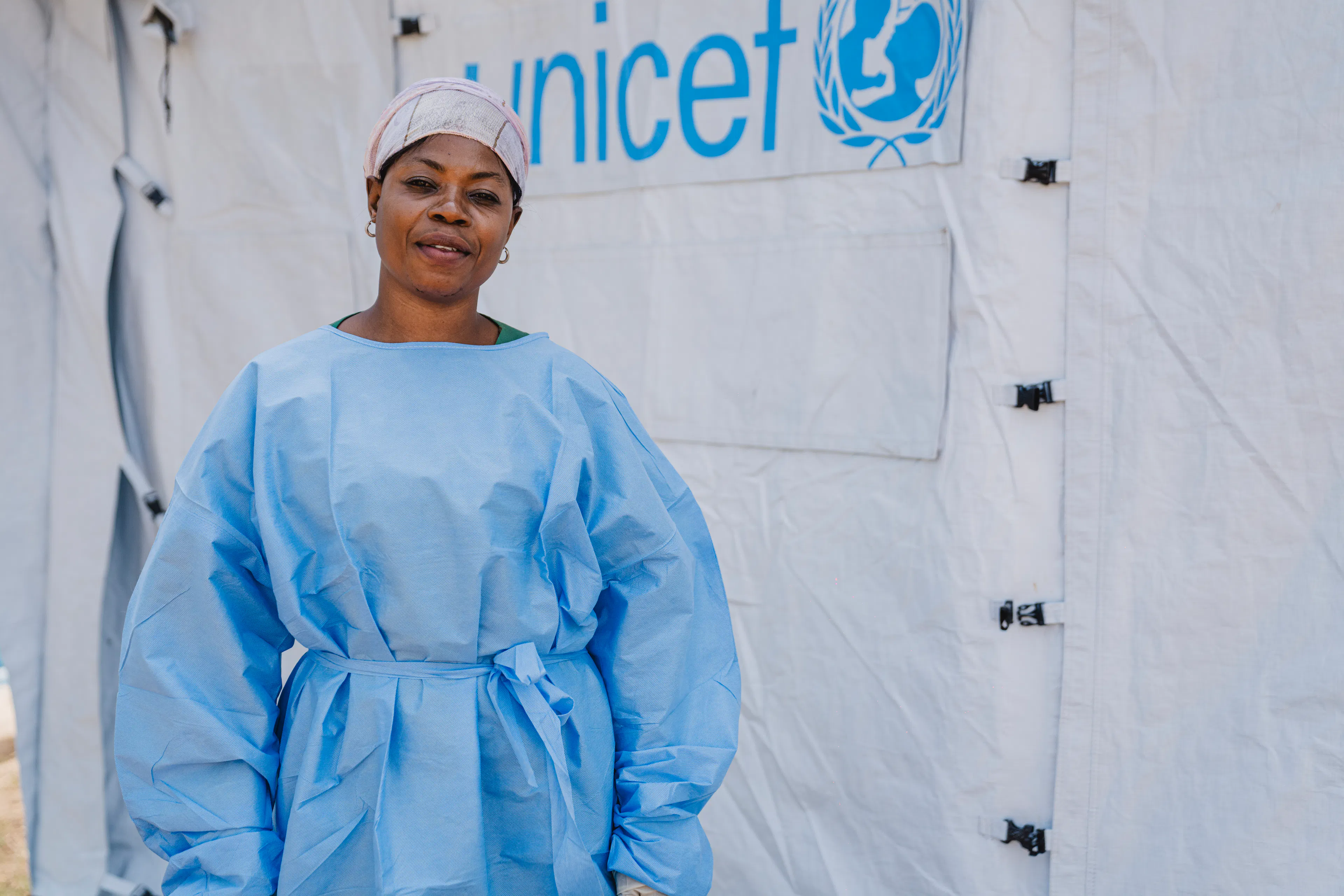 Wivine Kabala stands in front of the nursery near the Ebola Treatment Centre in Bunia, Ituri province, Democratic Republic of the Congo, on June 20, 2026.
