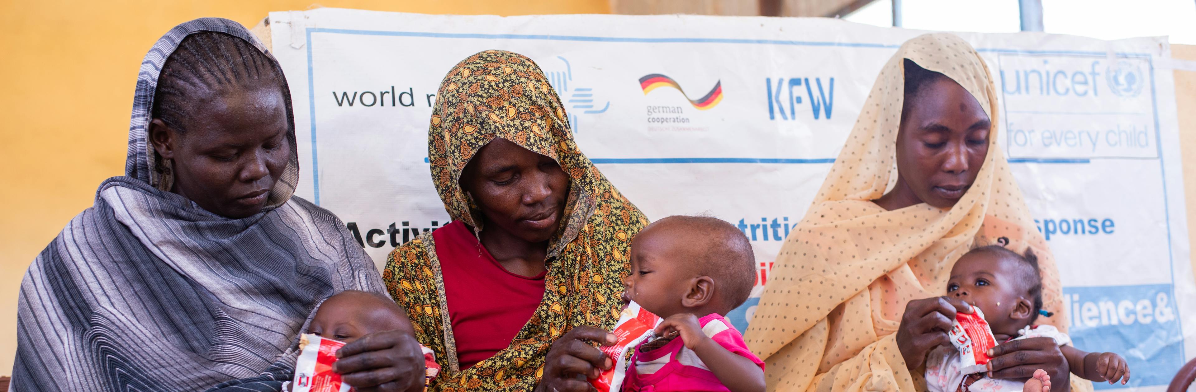 On 17 March 2025, mothers receive health and nutrition services from a UNICEF-supported clinic in Al-Hamidiya Camp, Zalingi, Central Darfur.