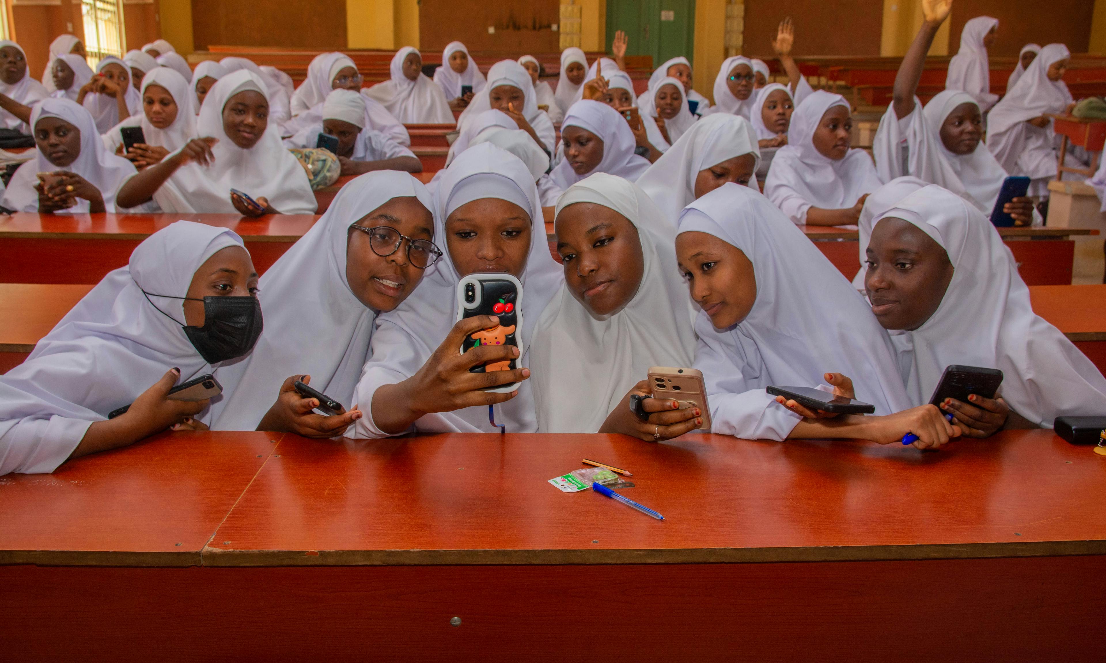 A collective of young midwife and nursing students in Katsina state, Nigeria, collaborating to generate ideas on the application of NLP within the context of the GESP Project.