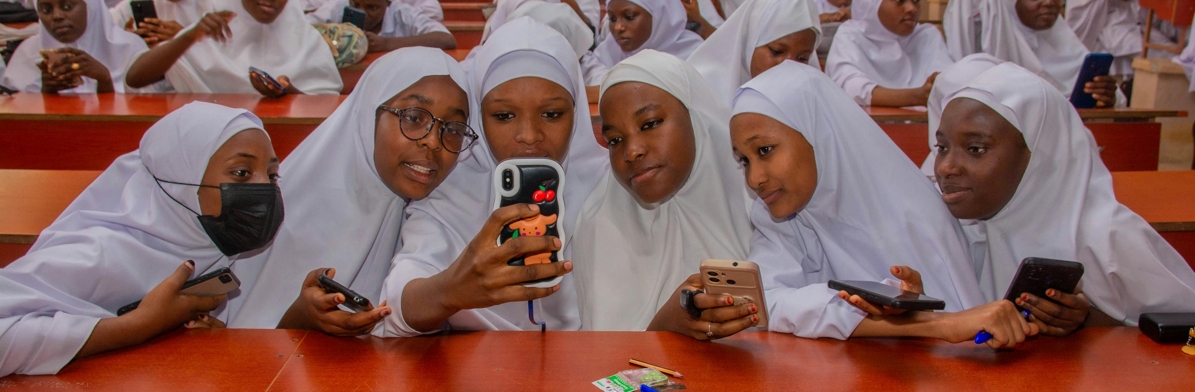 A collective of young midwife and nursing students in Katsina state, Nigeria, collaborating to generate ideas on the application of NLP within the context of the GESP Project.