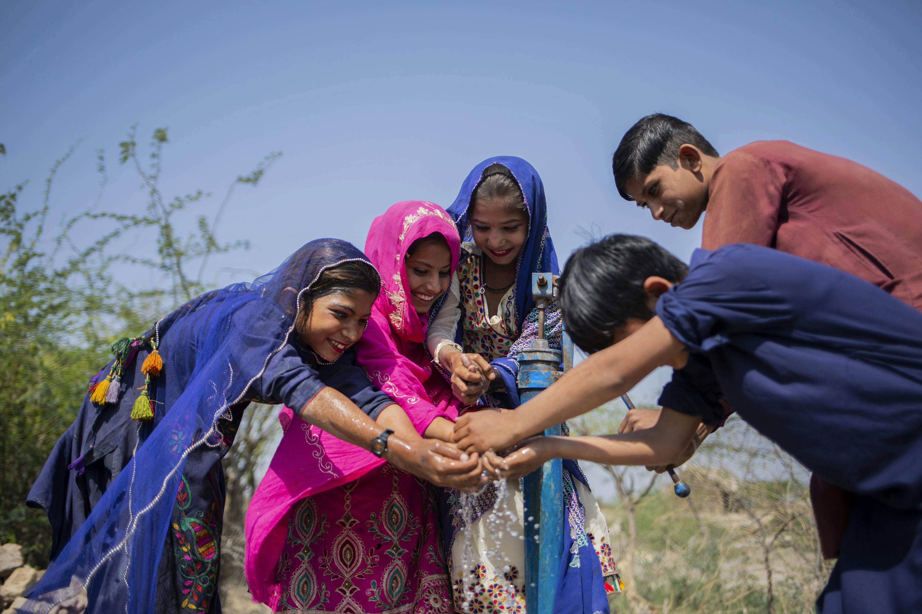 Kids in Sindh Province, Pakistan enjoying their new water pump.