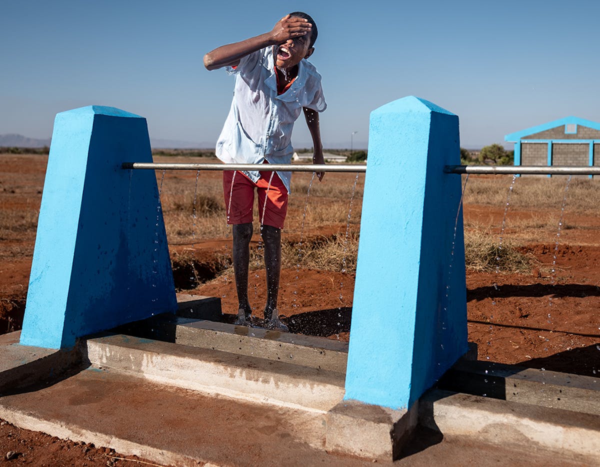 Ankaranabo General Education College, Bekily District, Androy Region, Madagascar: Mandimby, 16, a 3rd-grade student at Ankaranabo General Education College, enjoys using the school’s new handwashing facilities.