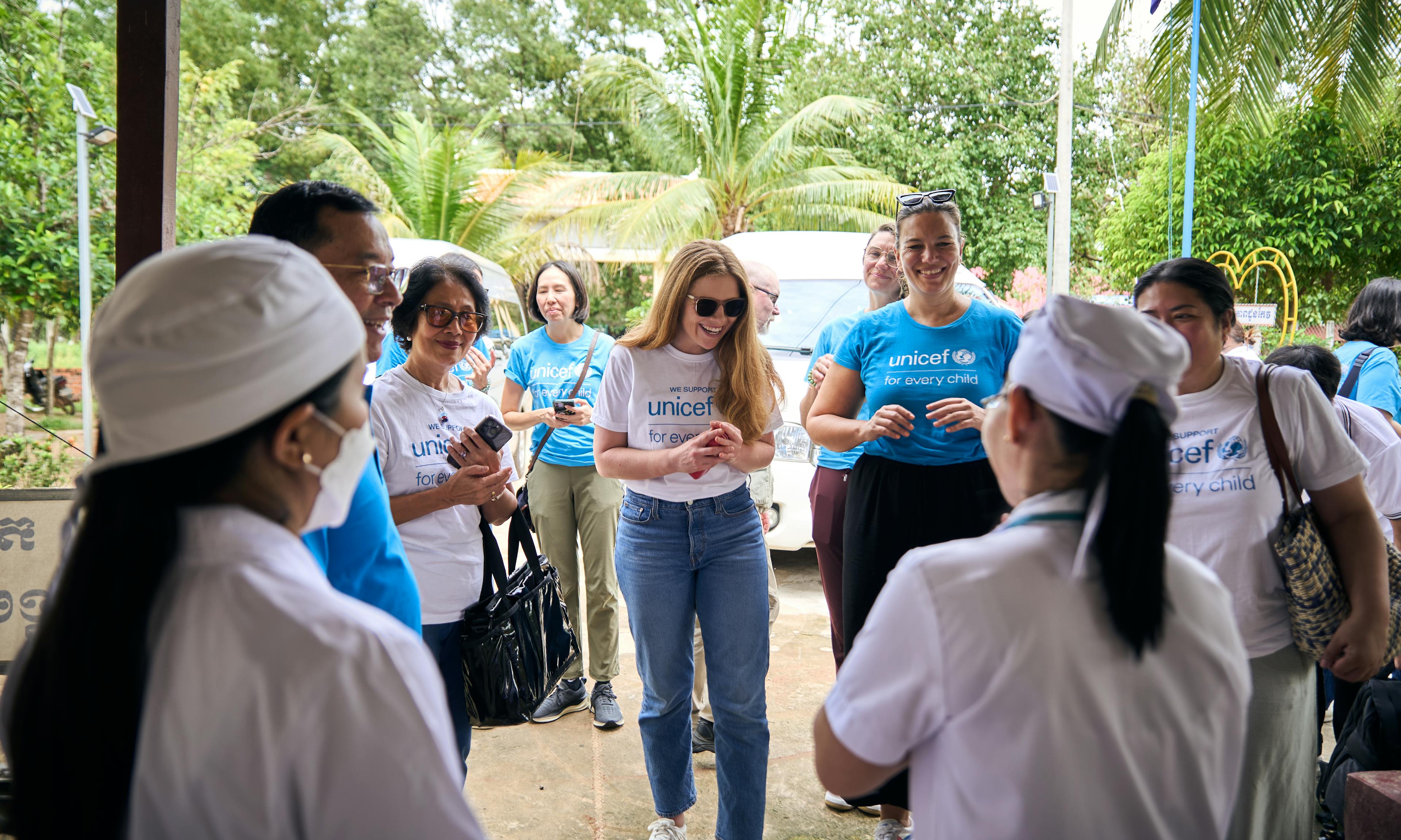 Innovation Manager at Les Mills International, Jo Perkins, and other representatives from partners across the Asia Pacific region, warmly welcomed by the health practitioners at the Daun Keo health centre, Siem Reap.