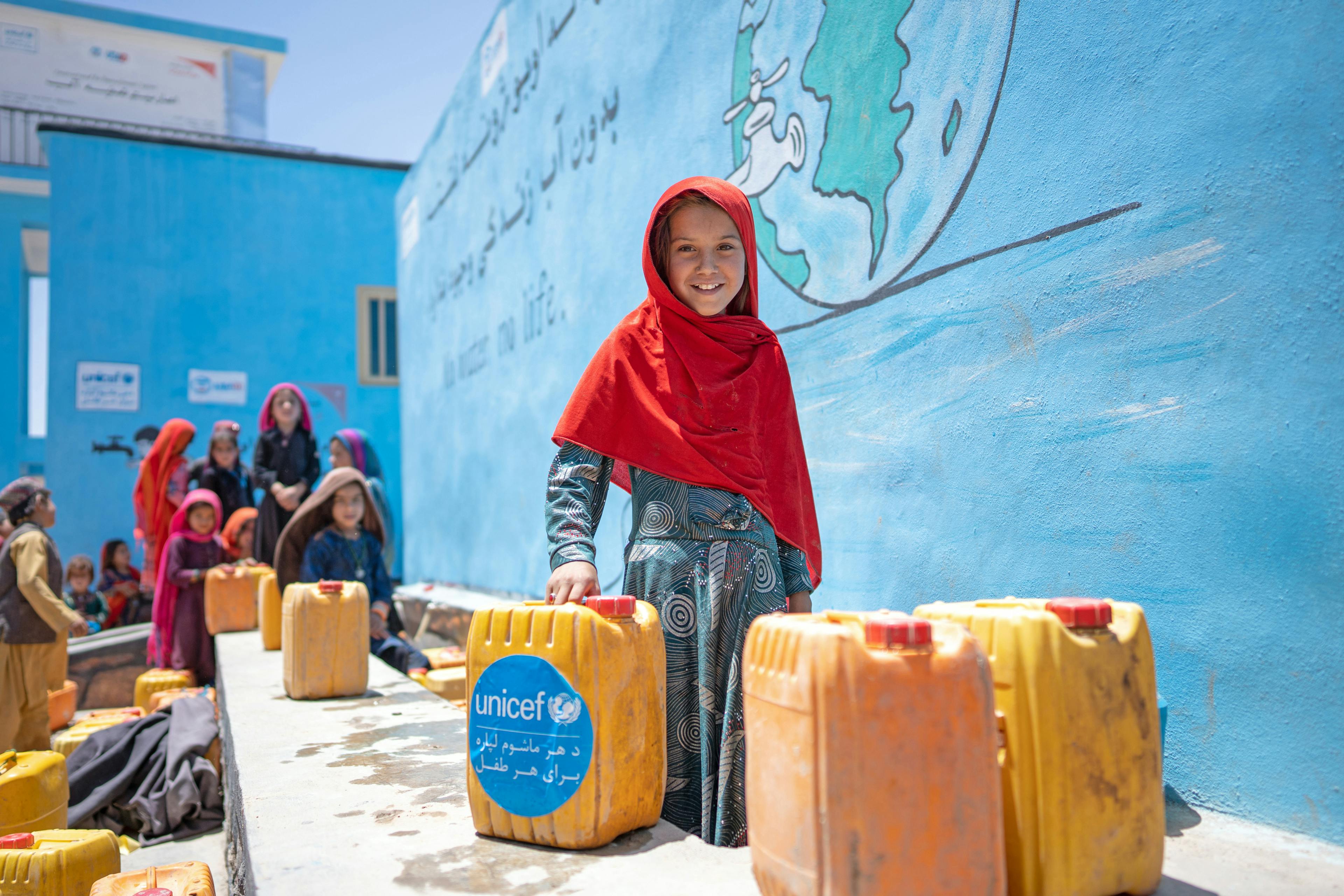 On 7th June 2023, 8 year old Hatima is photographed at a UNICEF-supported water point in Noorkhail village, Muqur District in Badghis Province, Afghanistan.