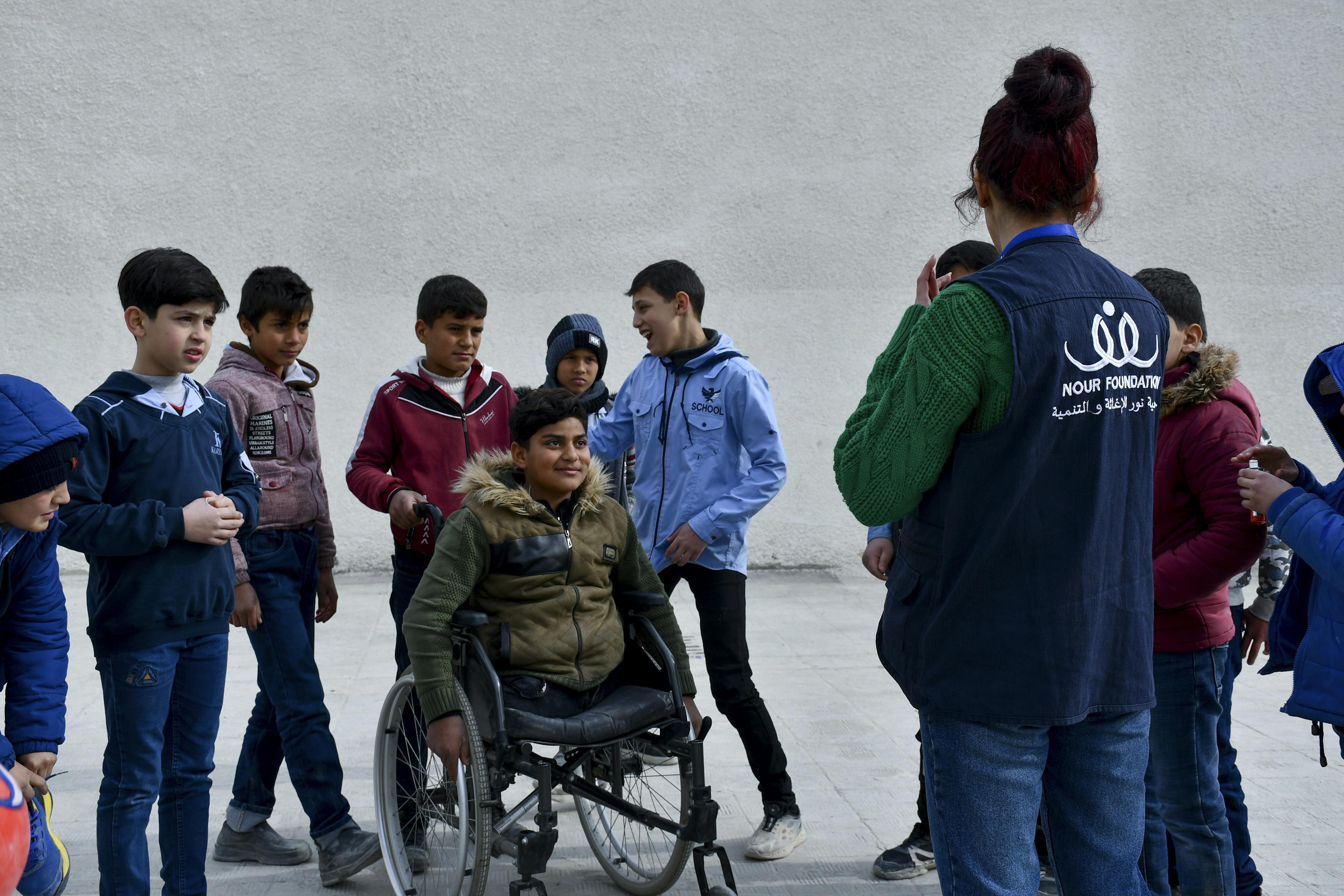 Yahia, 13, plays with his classmates in the schoolyard in Zabadin village, Rural Damascus, Syria, on 3 February 2025. The school was rehabilitated by UNICEF, and the activity is facilitated by a UNICEF-supported child protection mobile team.