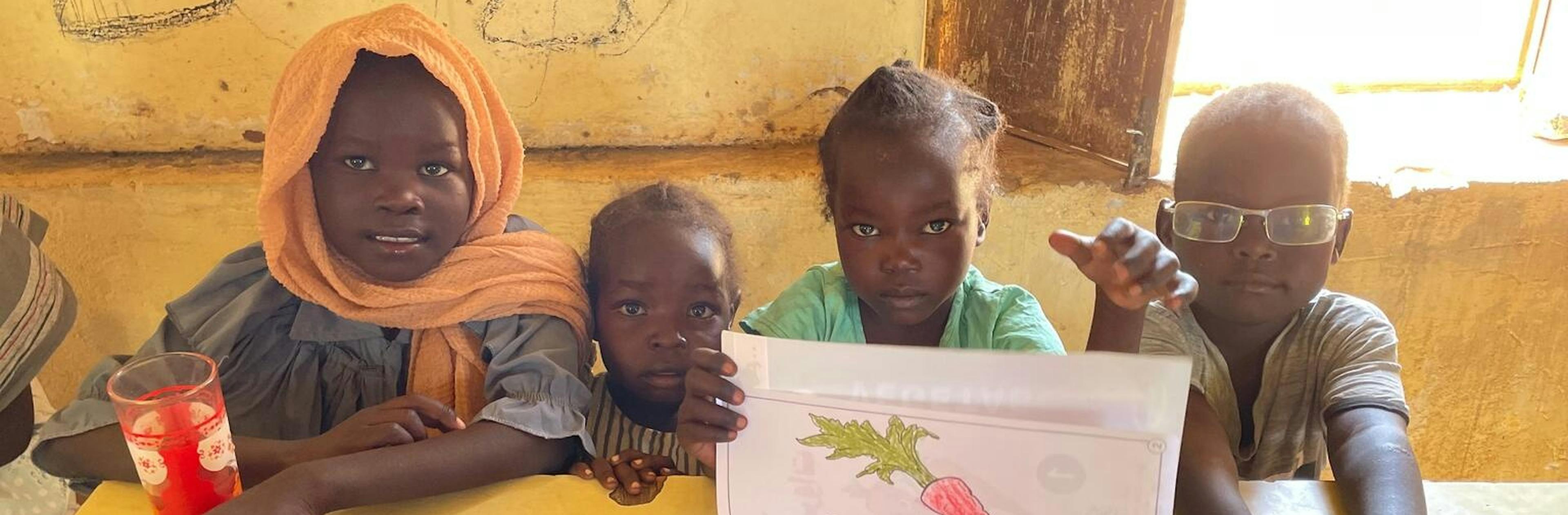 children attend one of UNICEF-supported child friendly spaces in Khartoum