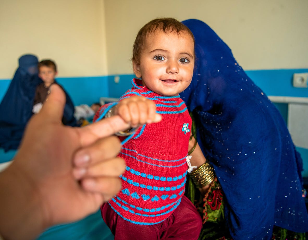 10-month-old Adela is photographed in the inpatient ward of Wardak Provincial Hospital with her mother.