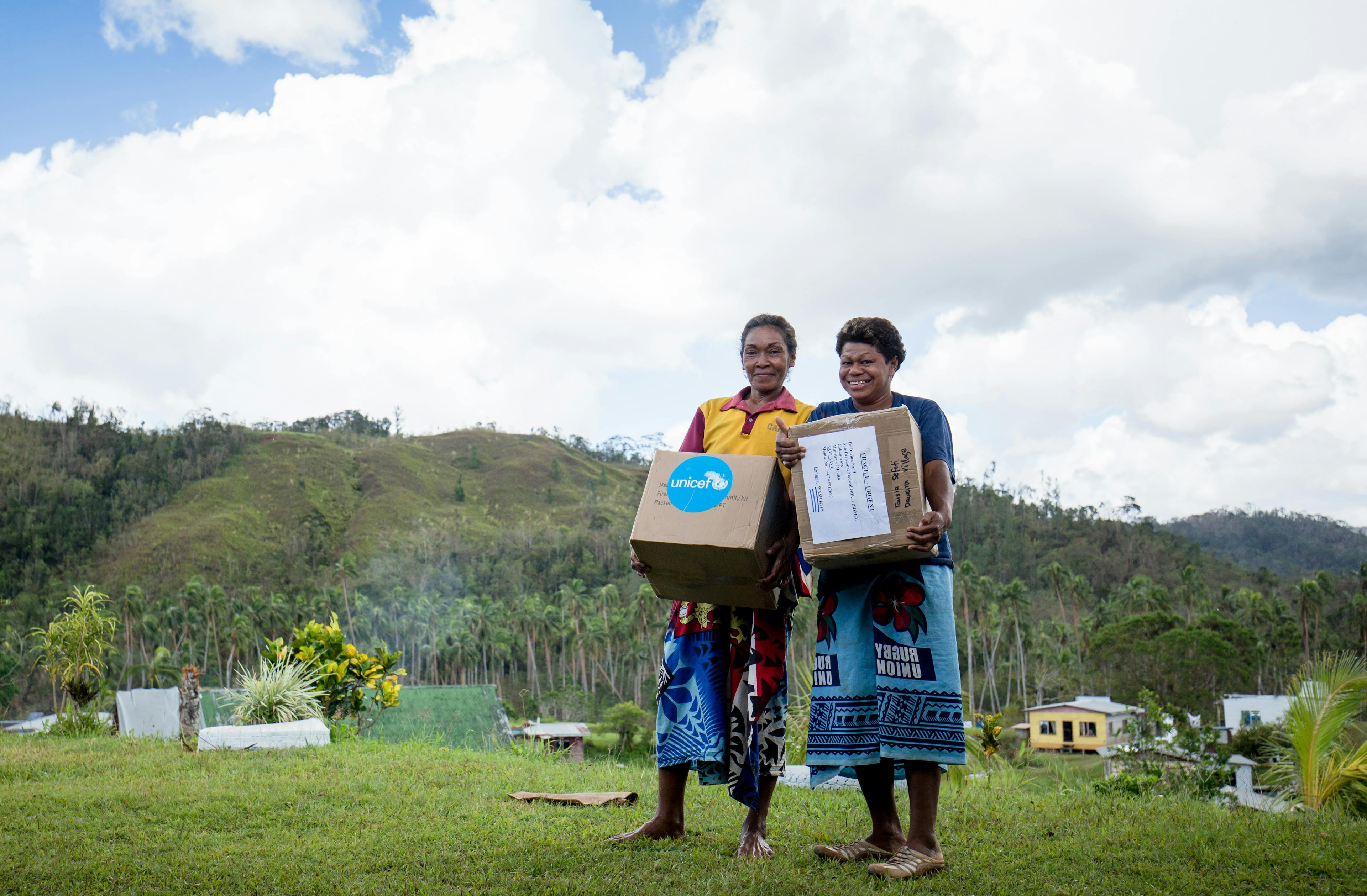 On 24 December 2020, Sereana Ratolo, 42 (right) and Tokasa Basilio, 51, received UNICEF's water and hygiene supplies.