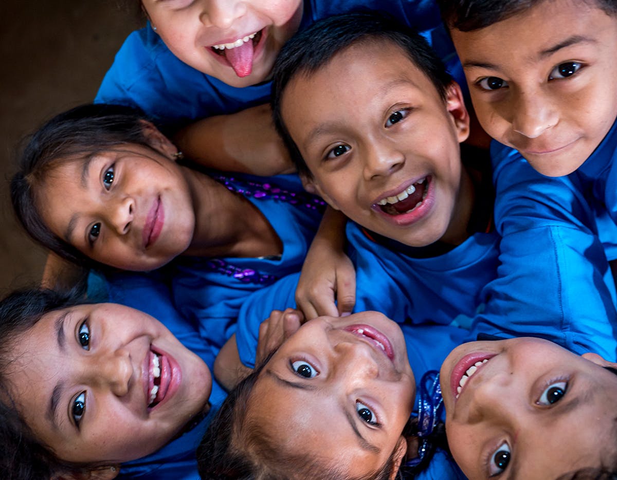 On March 29, 2023, in Chimaltenango, Guatemala, children from the JM Official Rural Mixed School smile and hug each other.

The current coverage in Guatemala of initial education for early childhood reaches only 2% of children and 36% for children between 16 and 18 years of age. It is necessary to increase investment in education so that all children have access to education and can reach their full potential.