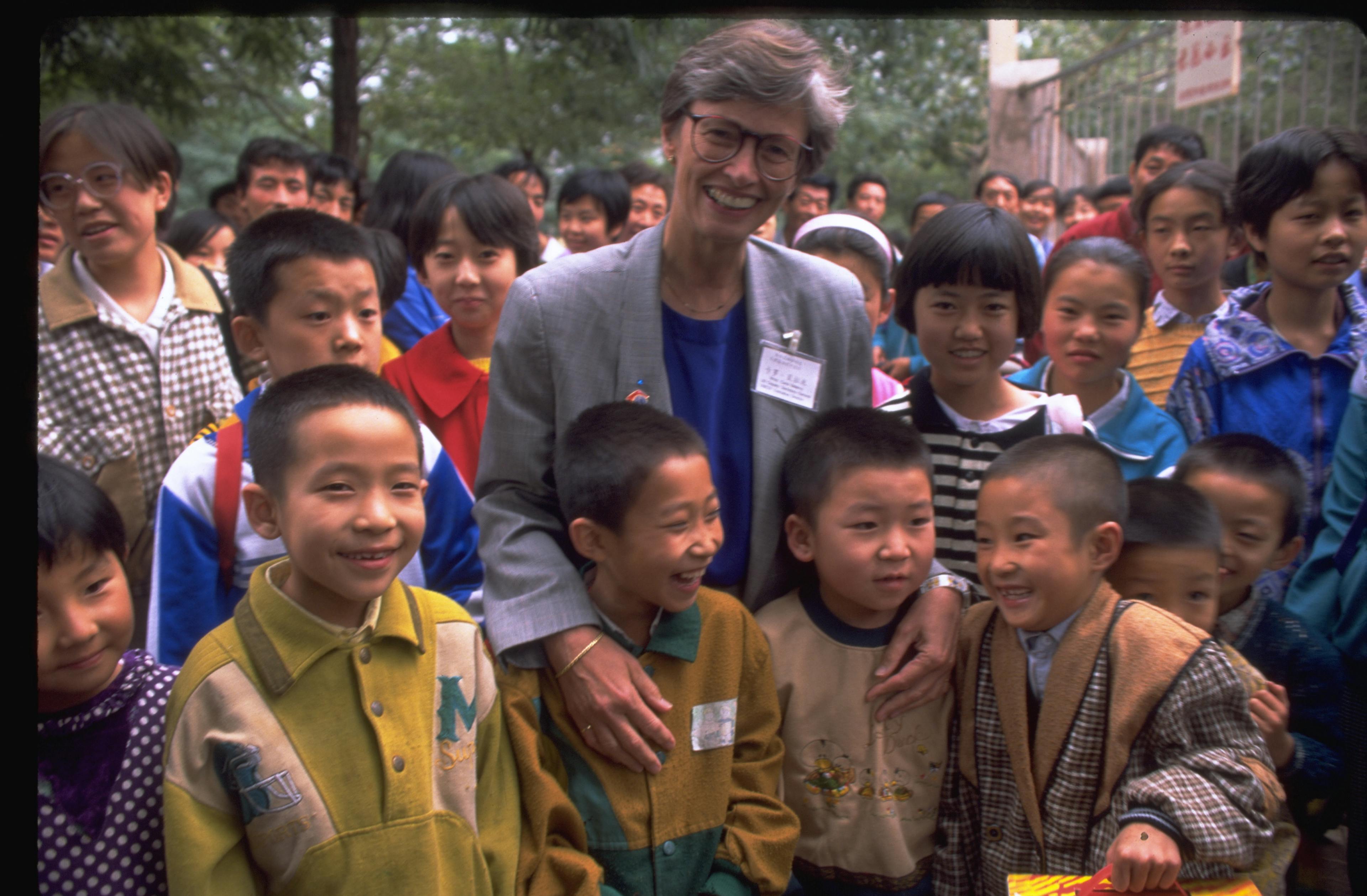 UNICEF Executive Director Carol Bellamy visits with children in the village of Bai Yin. While in the country, Ms. Bellamy also attended the Fourth World Conference on Women, held in Beijing, China.