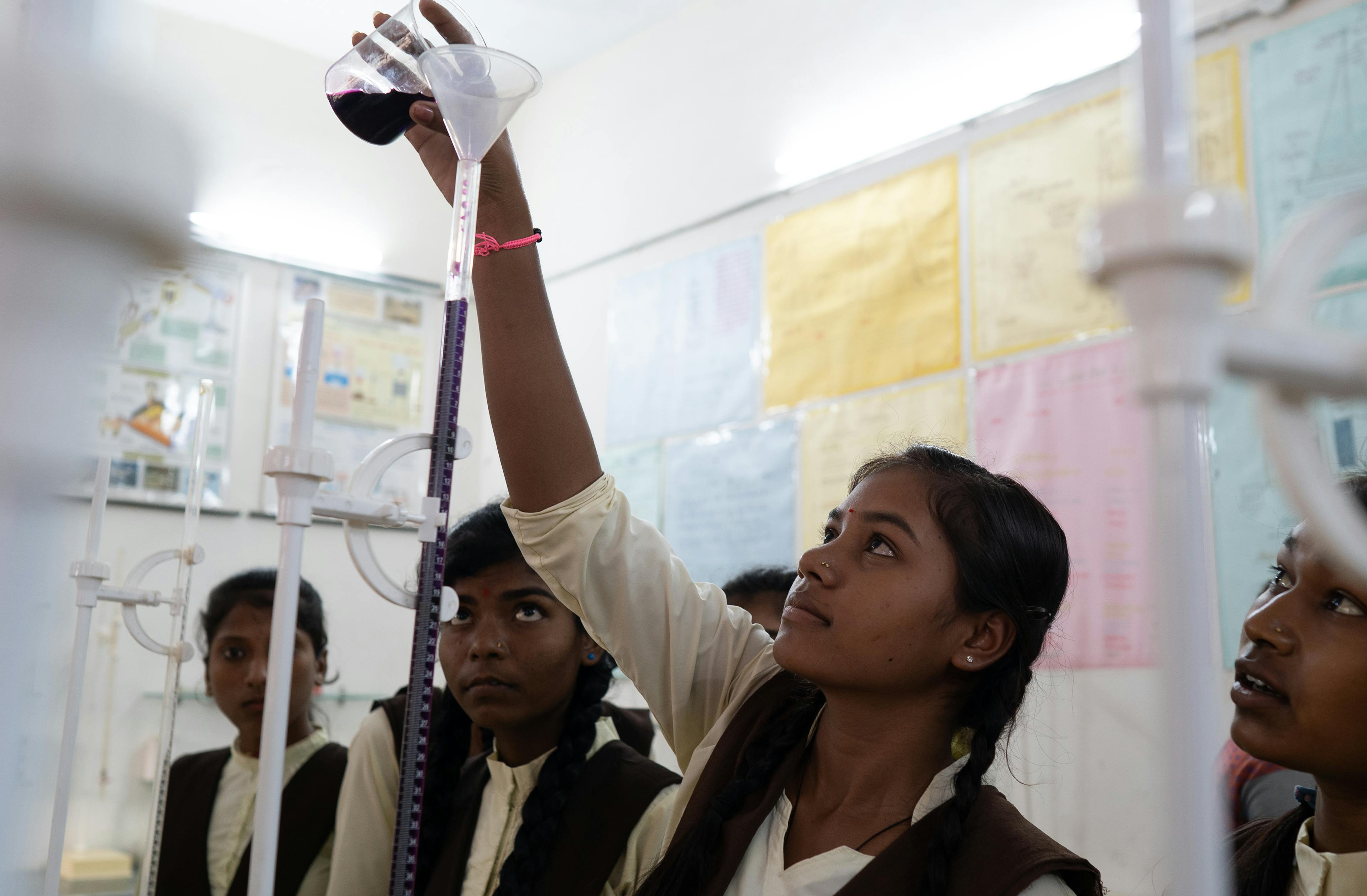 Students in a science lab. Students of Higher Secondary School Kesla, Hoshangabad have a well stocked library, an Astrology room full of models and well equipped science labs.
