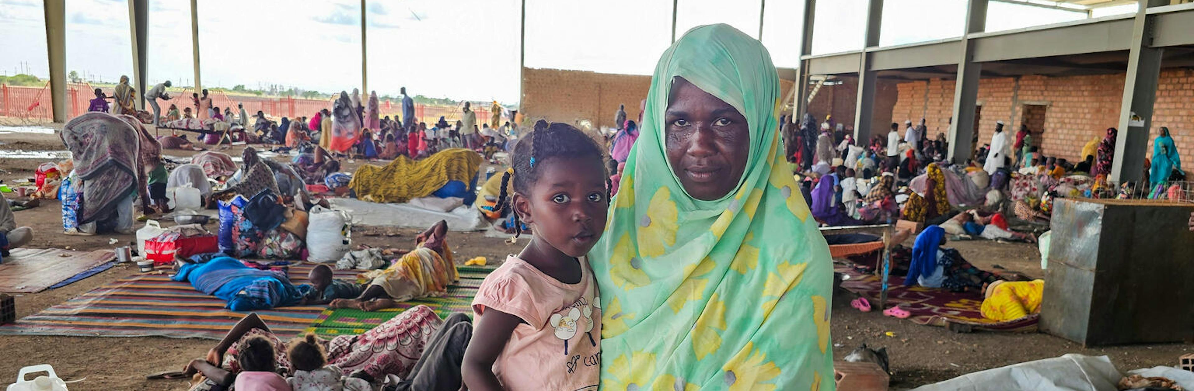 A displaced mother and daughter in Sudan.