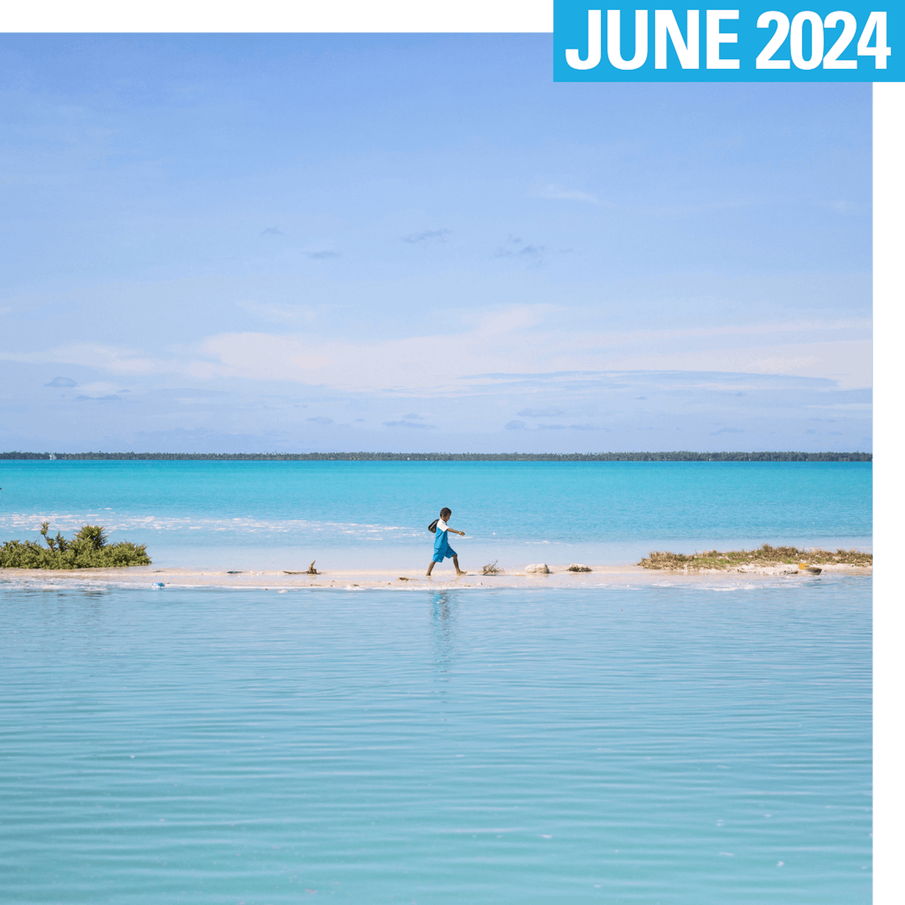 A boy walks from school to his house in Aberao village in South Tarawa, Kiribati. Kiribati is one of the countries most affected by sea level rise.