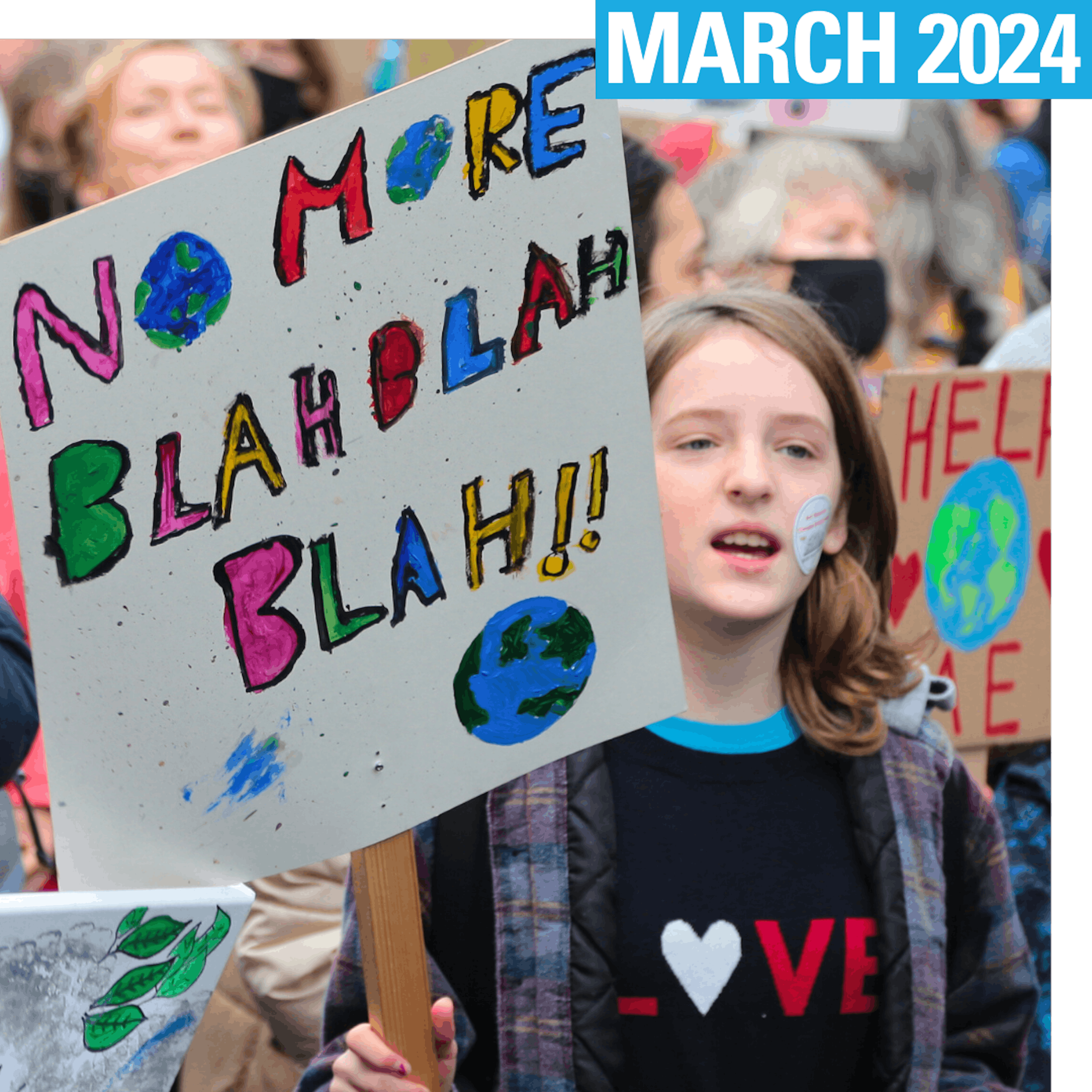 People taking part in a Fridays for Future demonstration for climate action, led by youth climate activists and organised on the sidelines of the 2021 UN Climate Change Conference (COP26).