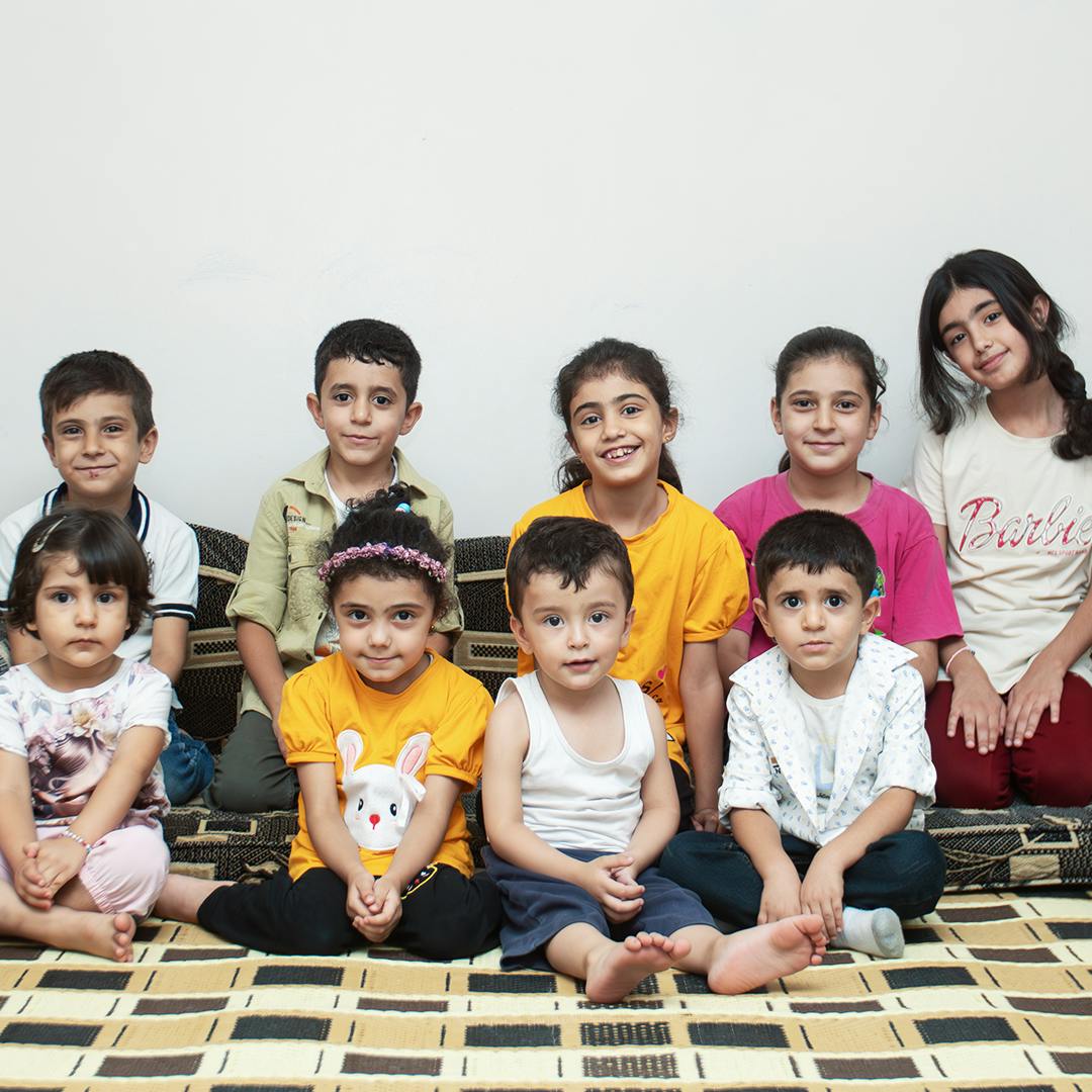 Leila’s grandchildren pose for a group photo at their grandparents' house in Western gathering, Kisweh city, Rural Damascus, Syria, 25 July 2024.