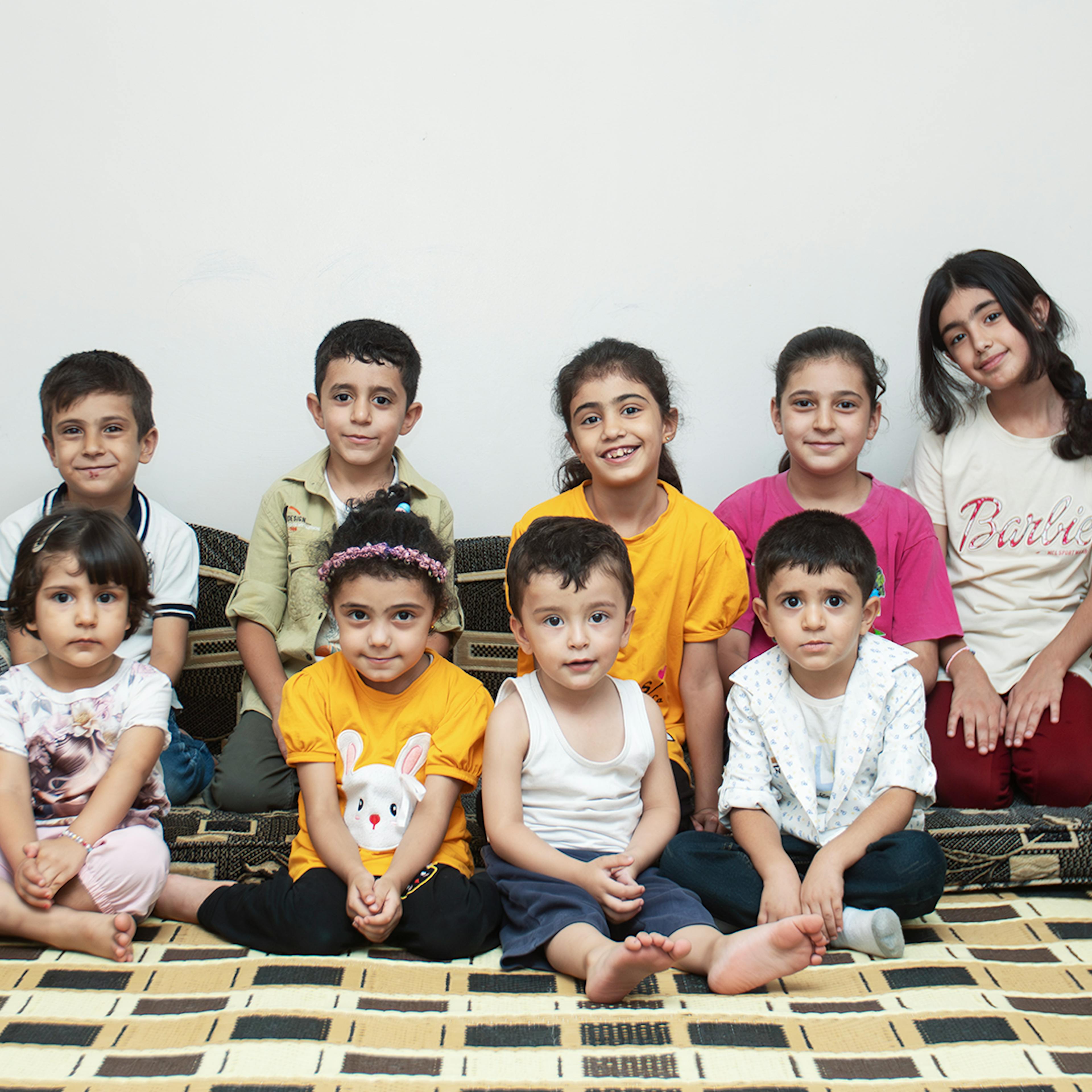 Leila’s grandchildren pose for a group photo at their grandparents' house in Western gathering, Kisweh city, Rural Damascus, Syria, 25 July 2024.