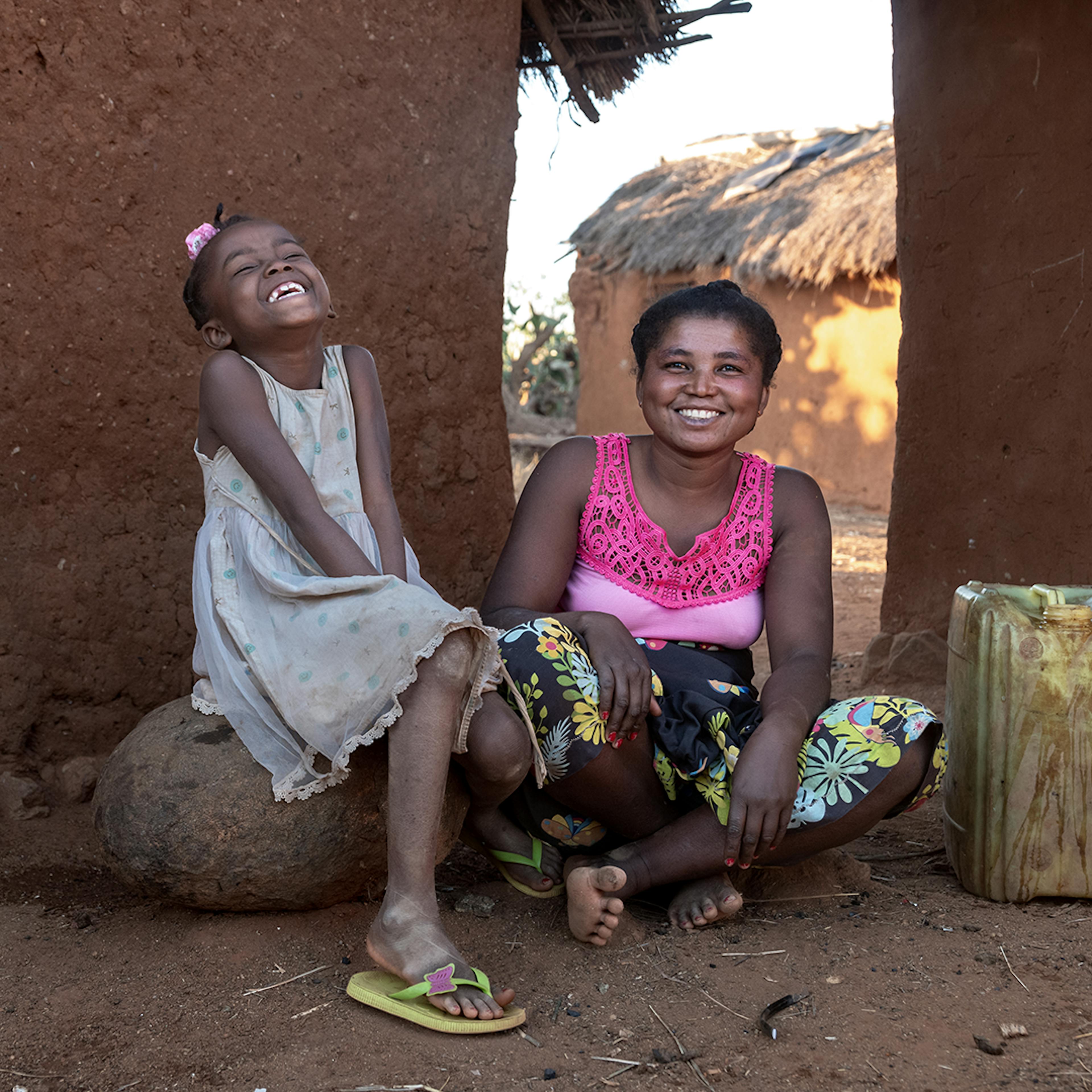 July 17, 2024 - Ankaranabo commune, Bekily District, Androy Region, Madagascar: Variana, 29, a mother of four and a farmer, is seen with her daughter Deltine, 8, after fetching water from one of the newly installed water faucets.