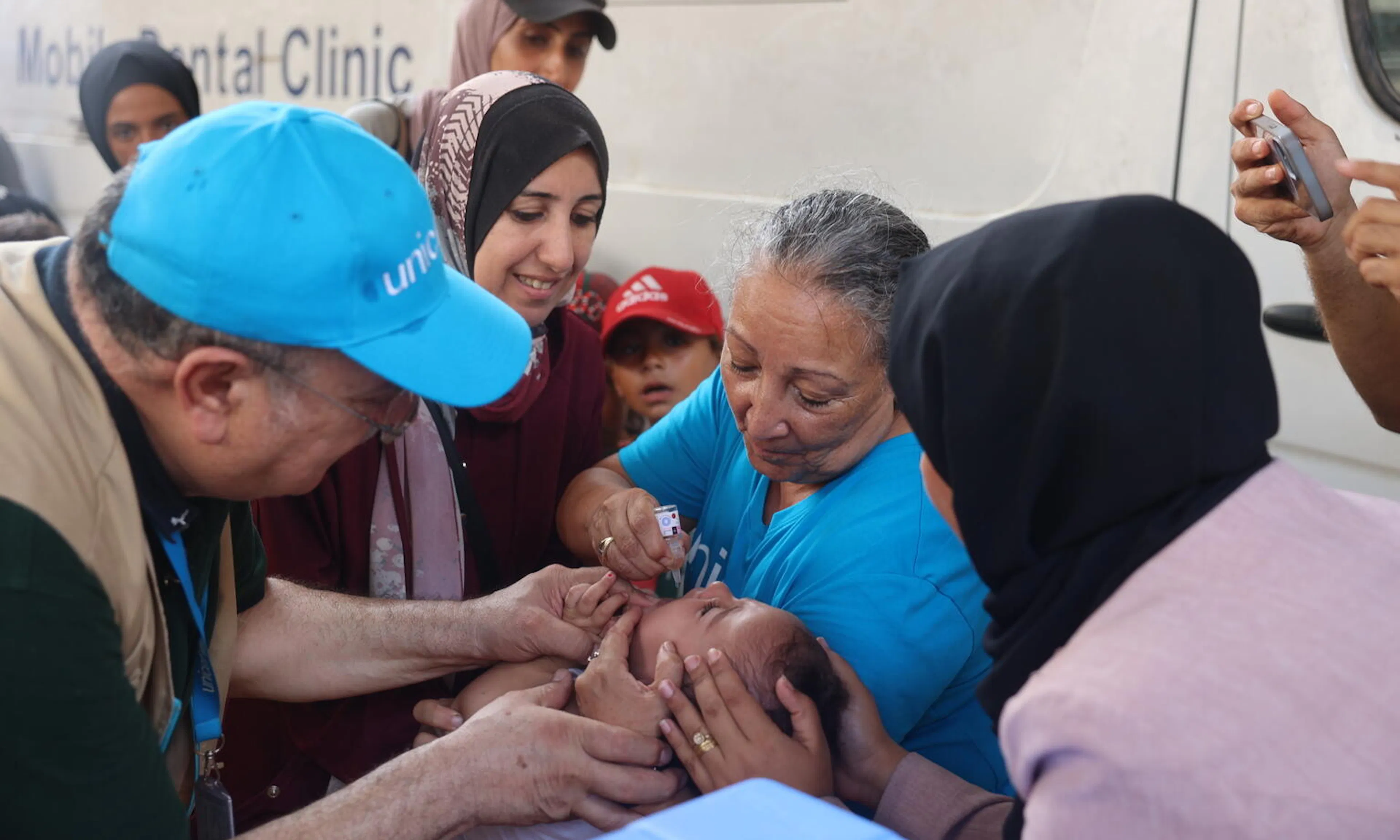 UNICEF staff administrating polio vaccines at UNRWA health clinic in Deir al-Balah in the center of the Gaza Strip. 