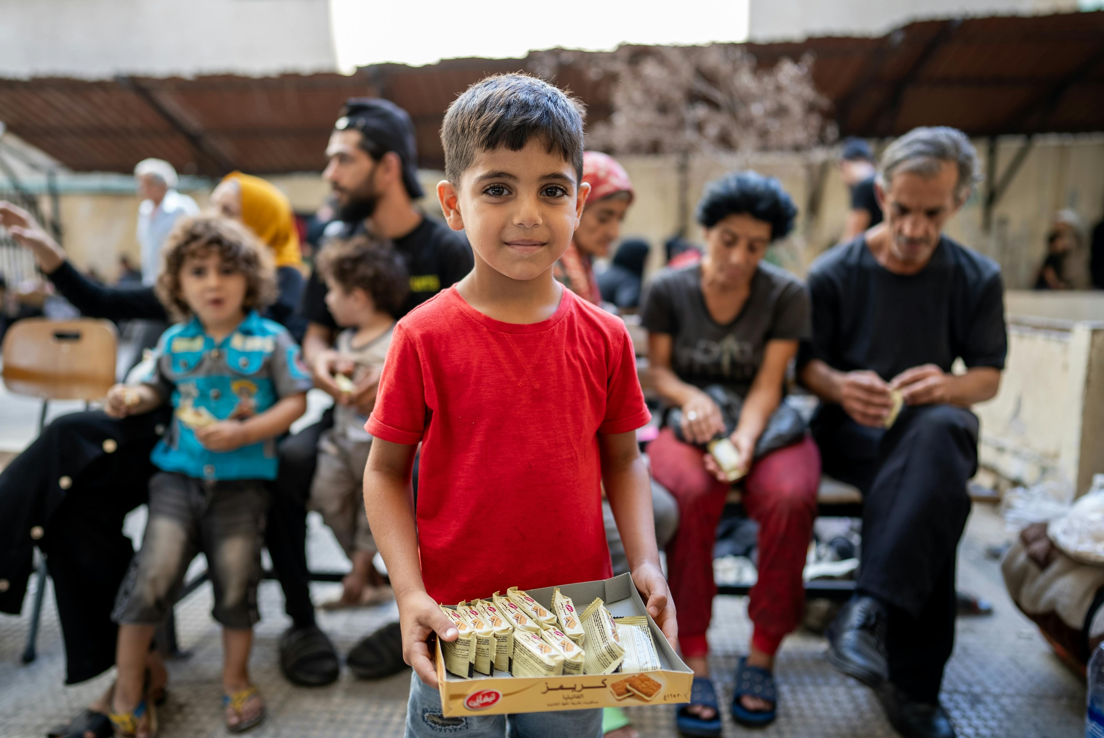 Firas, 6 years old displaced from southern Lebanon. He is with his family in the Lebanese university in Beirut that was turned into a shelter.