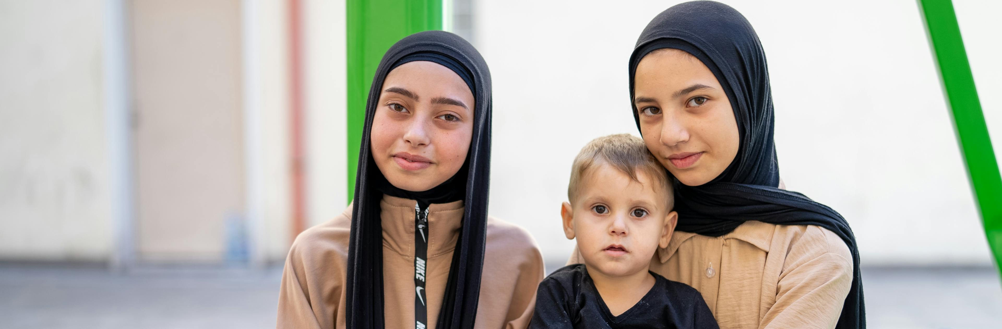 Luna, Fatima, and Amir, aged 15, 15, and 2, were displaced from south Lebanon and are now living in a shelter in Beirut.