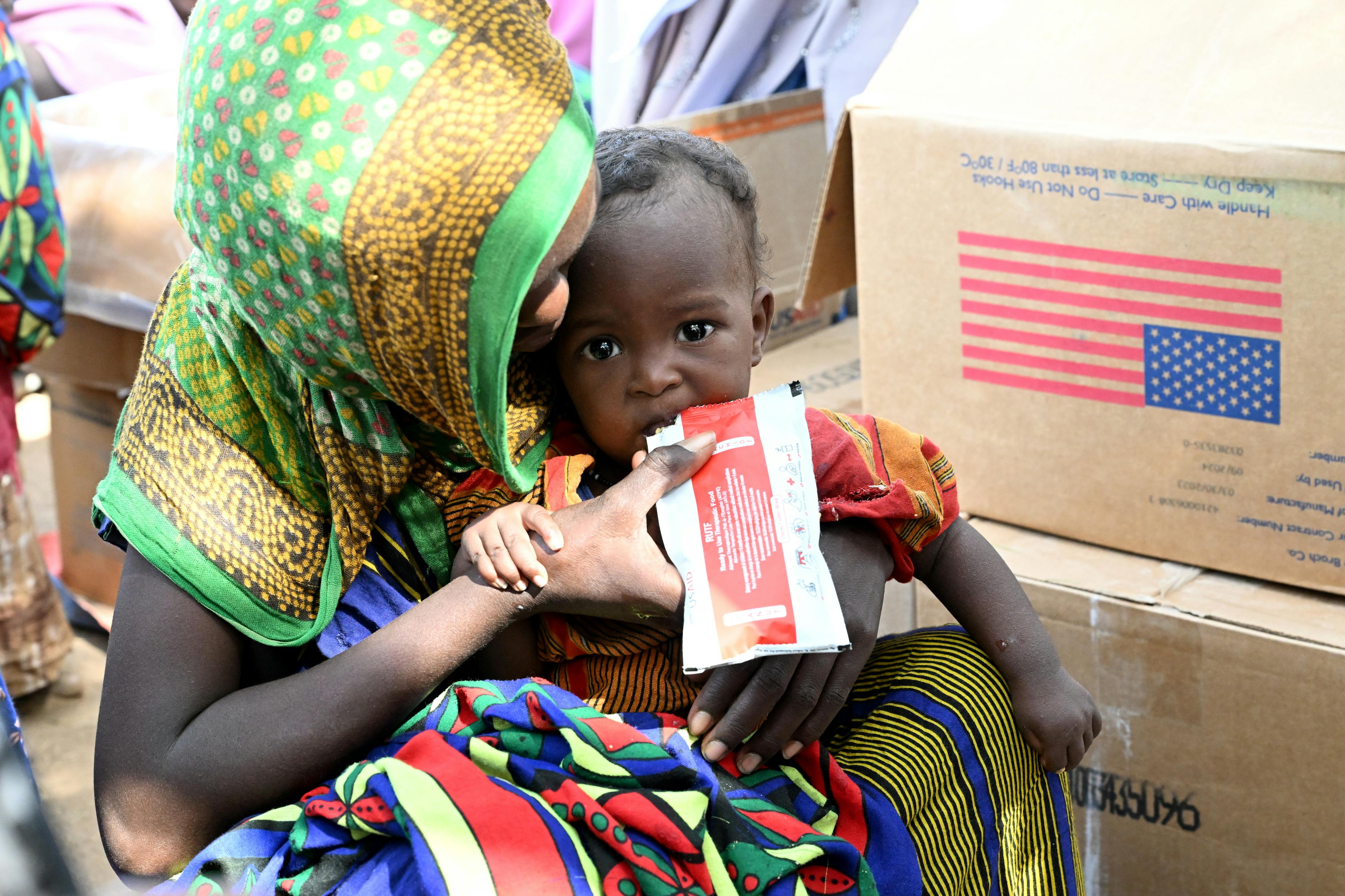 Amina Ilihate and Anahi Hassen, her 9 month old  baby who receives nutritional supplements at the mobile health center, in one of the weredas in Elidar district, in northeastern Ethiopia.