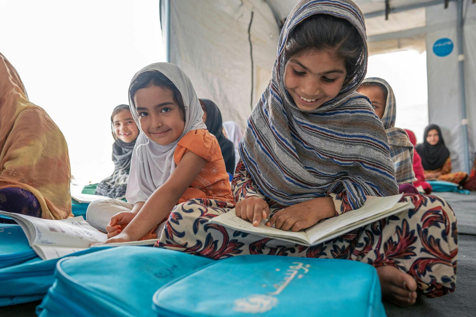 Primary-aged girls attend class at a UNICEF-supported community-based education centre in Kabul Province, Afghanistan.