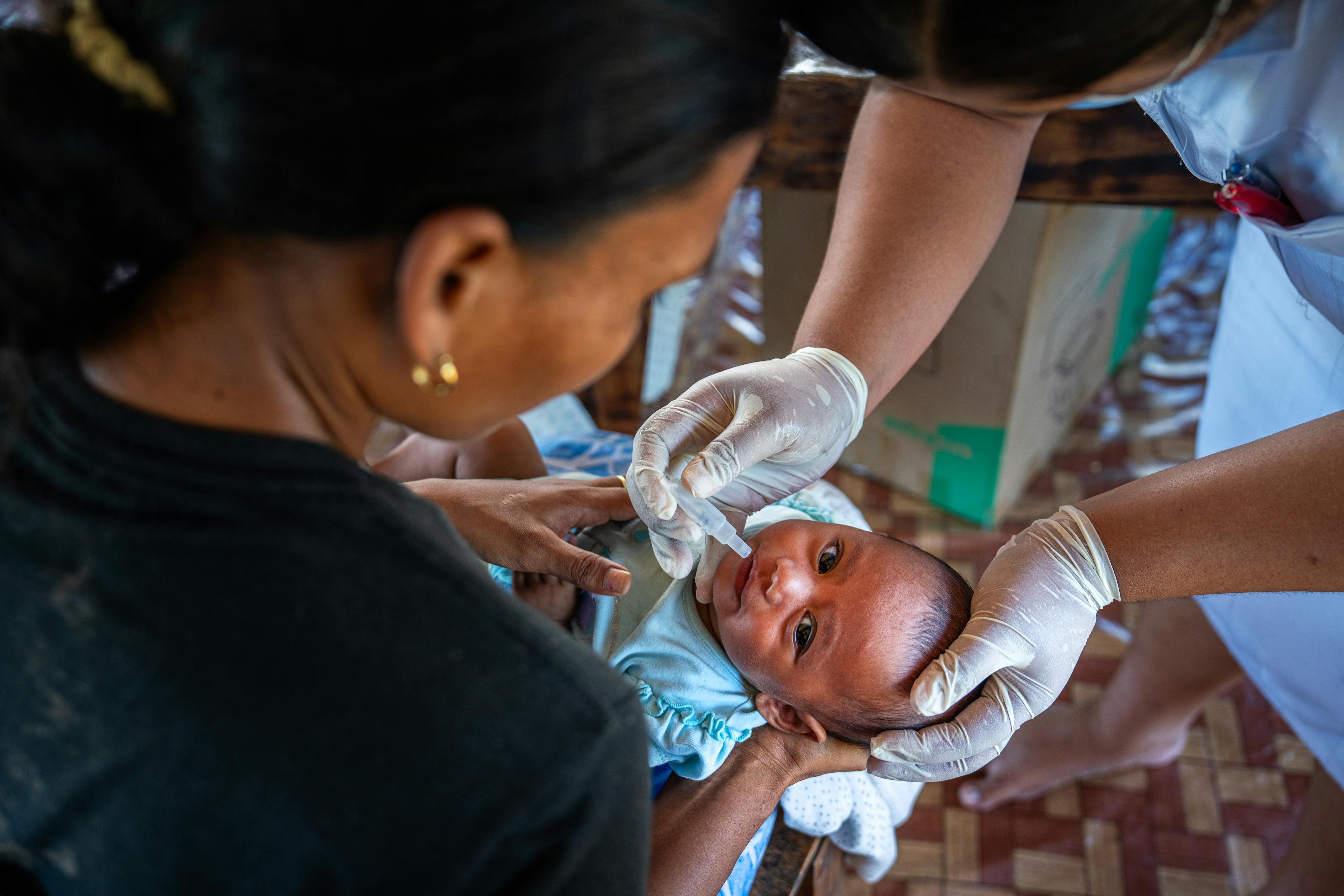 On 29 August, nurses from Faleolo Hospital administer vaccinations during a mobile vaccination session at a village in Samoa, bringing essential healthcare to the community.