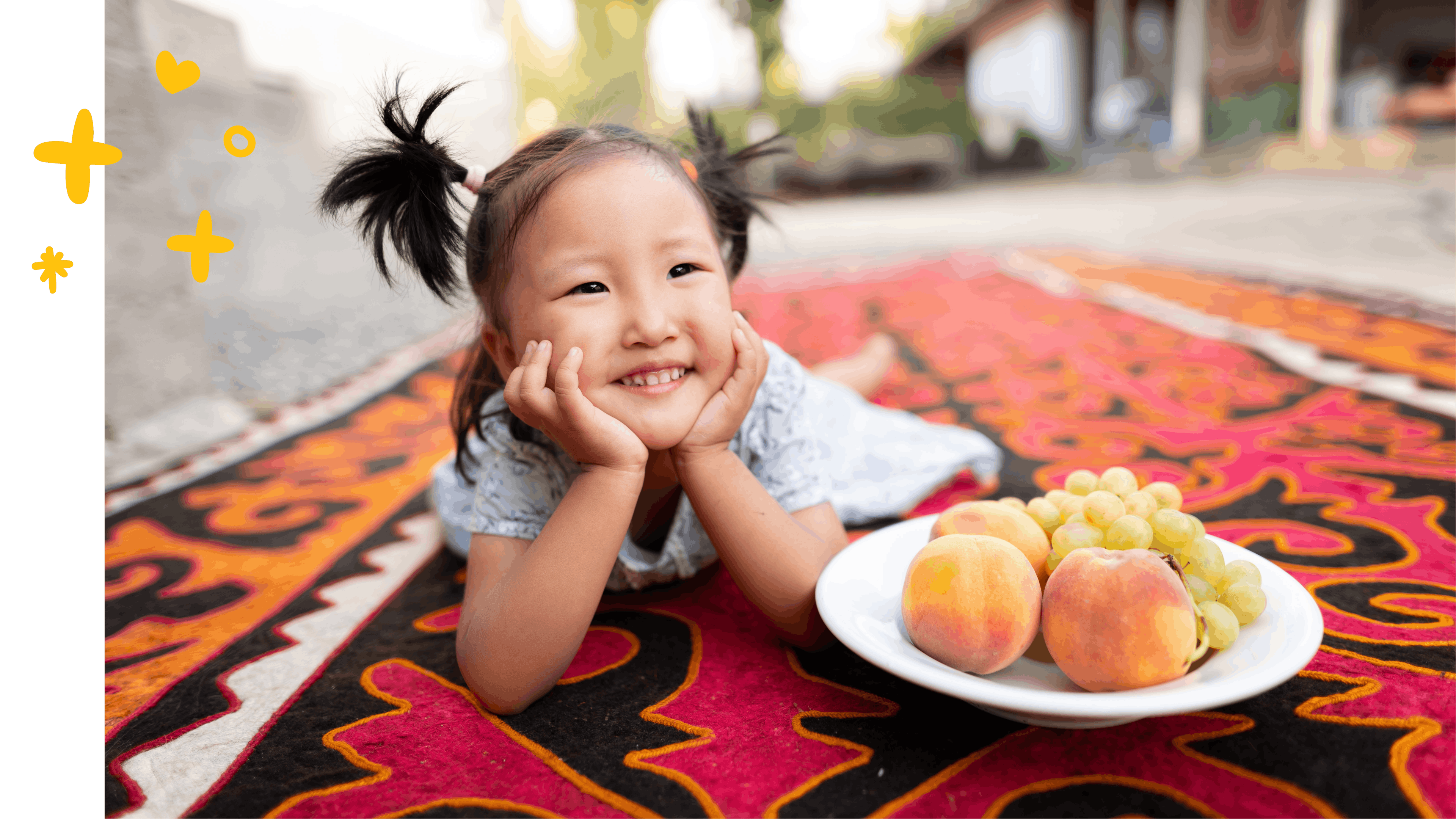 Nurayim, 3 years old, poses for a photo with a plate of fruit at her home in Kurshab village, Uzgen district, Osh Oblast, Kyrgyzstan. Her mother tells us that she adapted well to eating food that the rest of the family eats – dairy products, meat fish, poultry, eggs, fruits and vegetables. The family avoids unhealthy foods in every way possible. They have not experienced any difficulties in obtaining wholesome foods in their region, and also have a garden where they grow some vegetables.