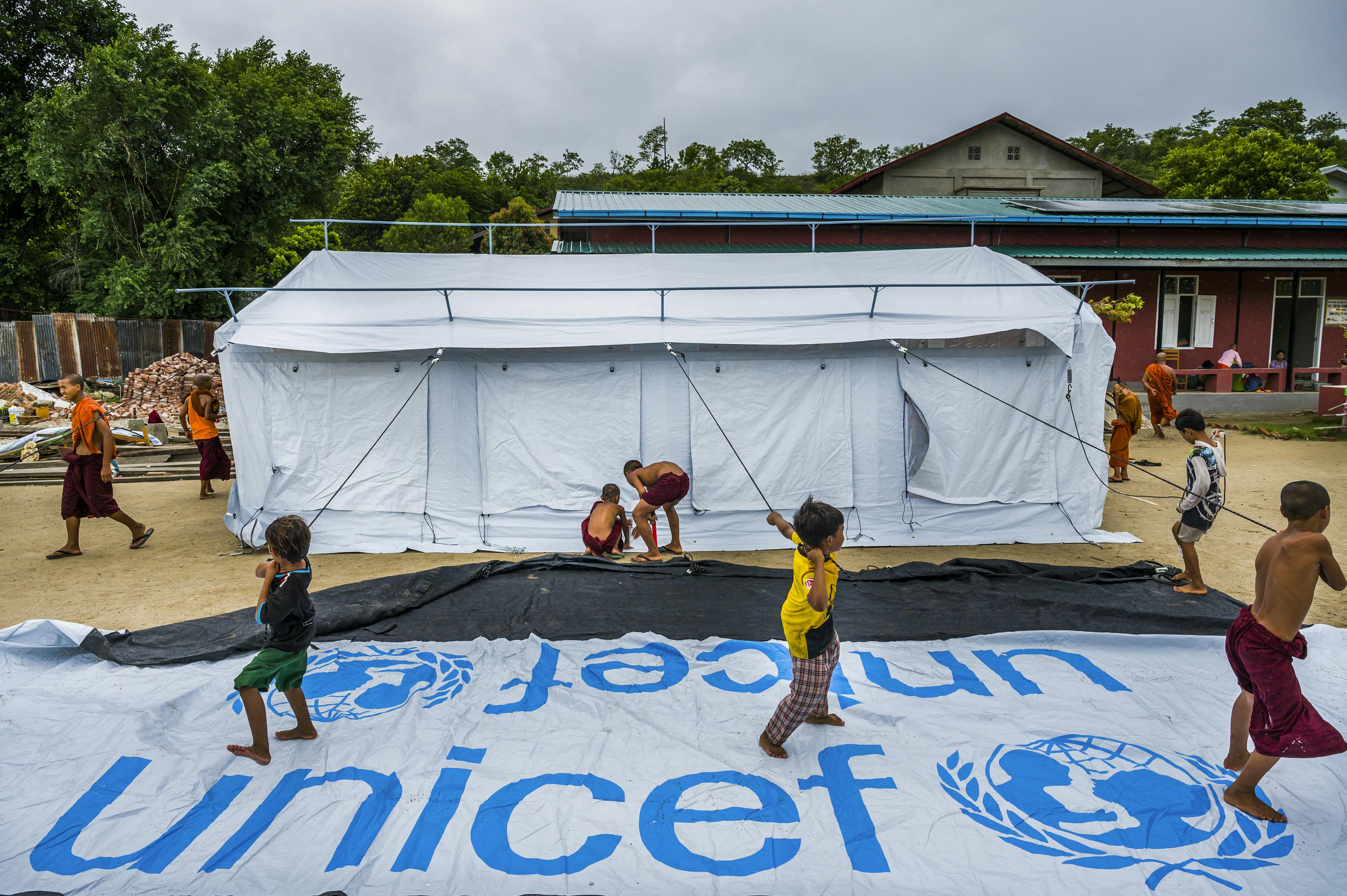 Myanmar children playing at UNICEF aid site