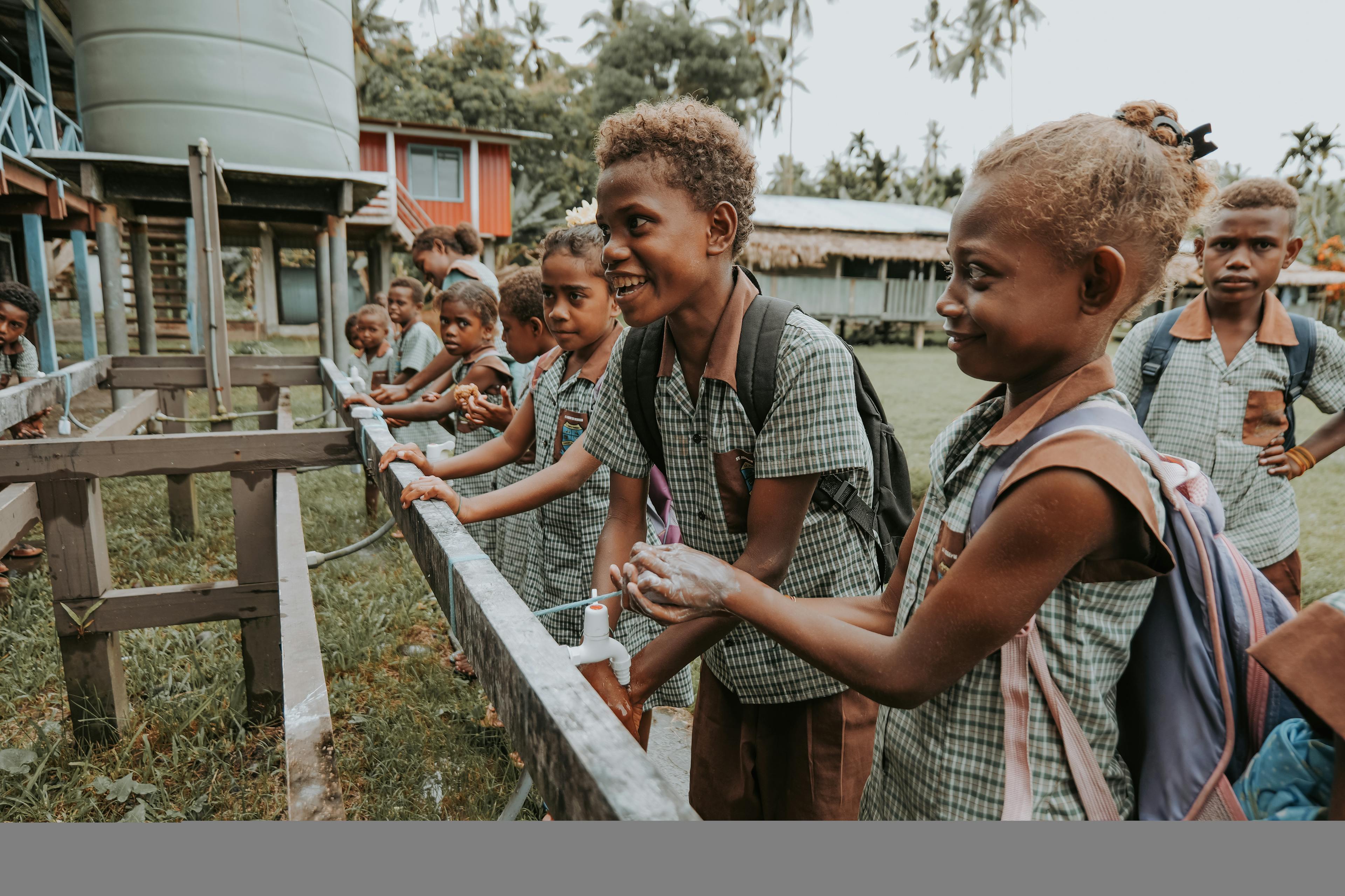 Kids washing hands in the Solomon Islands.