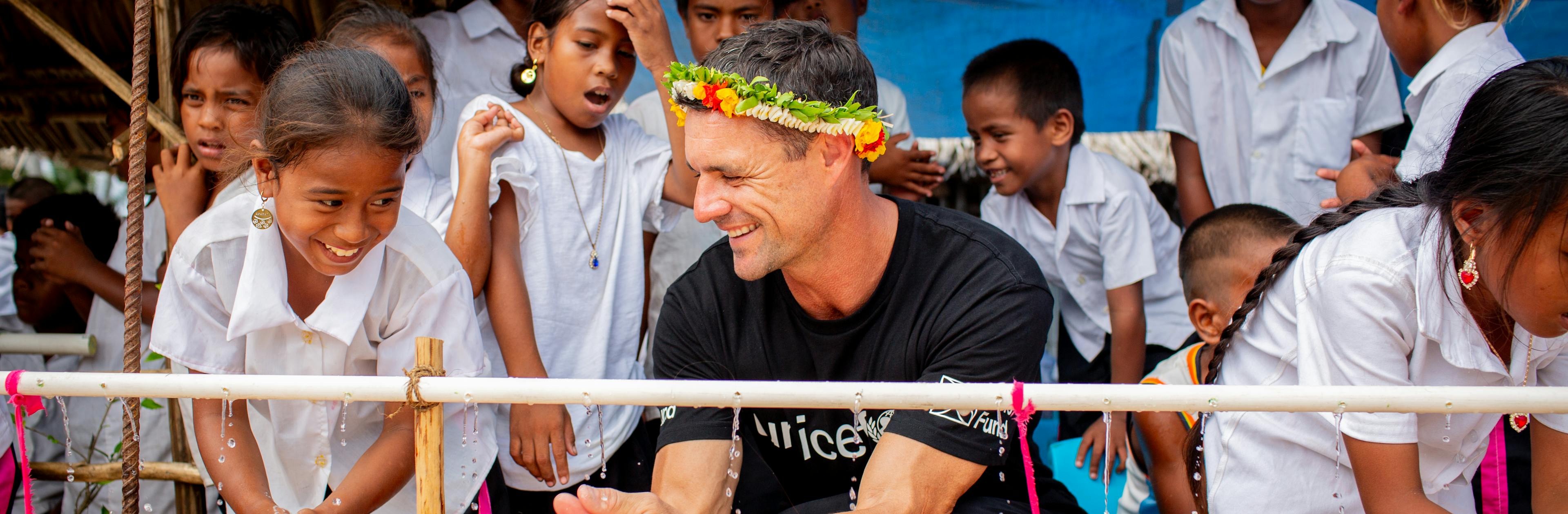 UNICEF Aotearoa Ambassador, Dan Carter, on his first visit to Kiribati.