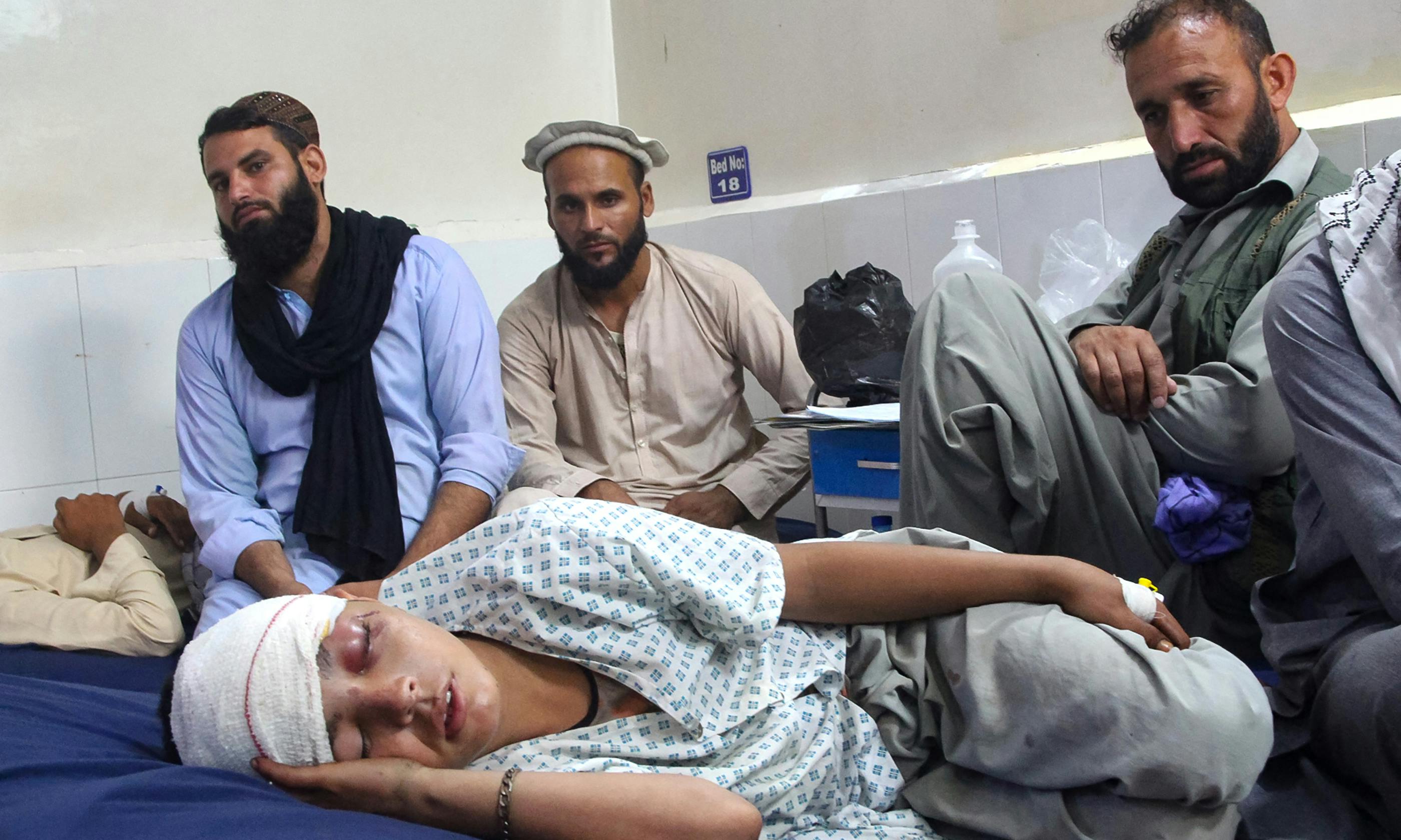 An injured Afghan boy (bottom) receives treatment at a hospital after an earthquake in Afghanistan's Jalalabad on September 1, 2025. ©UNICEF/UNI856118/Zahir, AFP