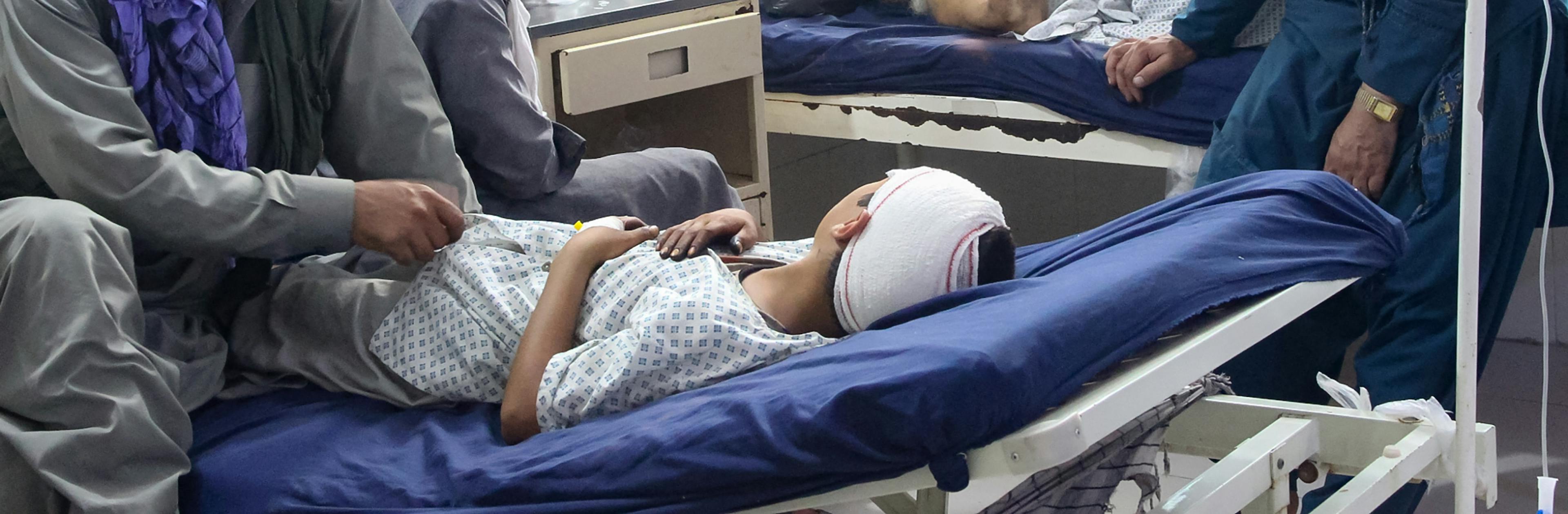 An injured Afghan boy (bottom) receives treatment at a hospital after an earthquake in Afghanistan's Jalalabad on September 1, 2025. ©UNICEF/UNI856118/Zahir, AFP