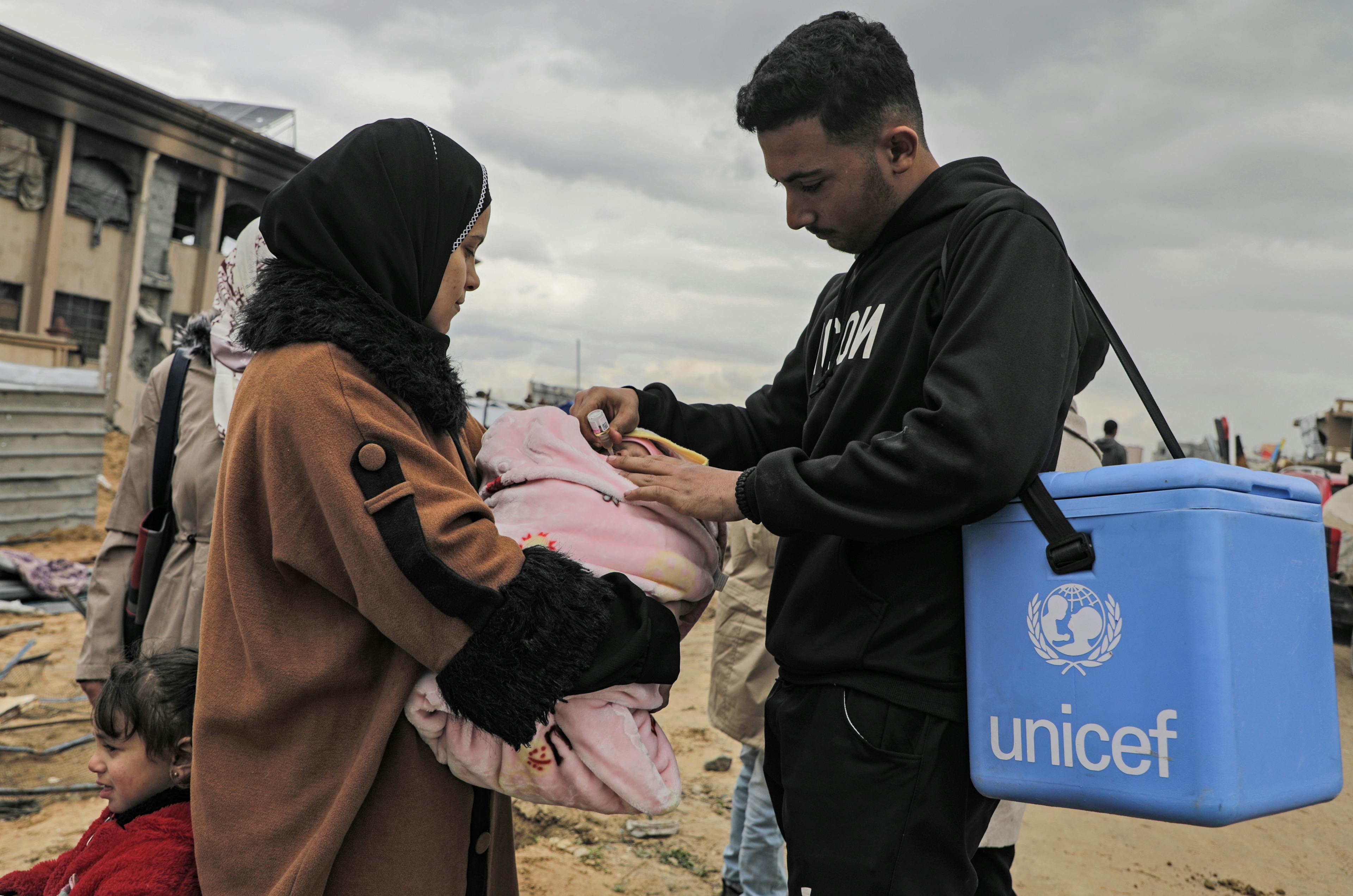Children are receiving polio vaccines in Jabalia north of the Gaza Strip 