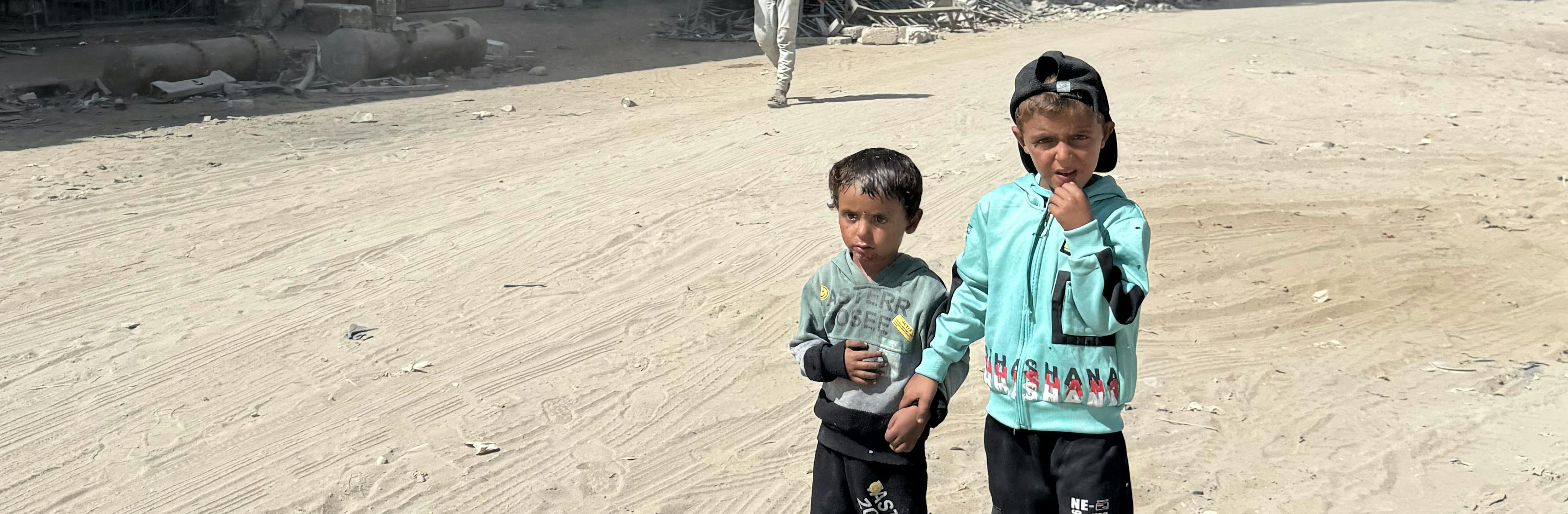 Children stand in the streets of Gaza City in the Gaza Strip on 2 October 2025.