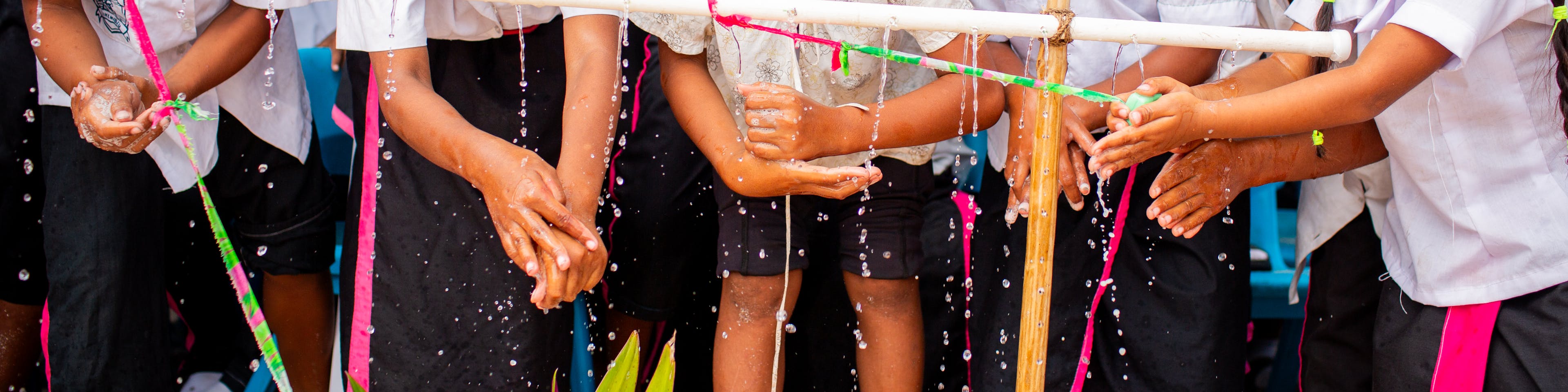 Children washing their hands