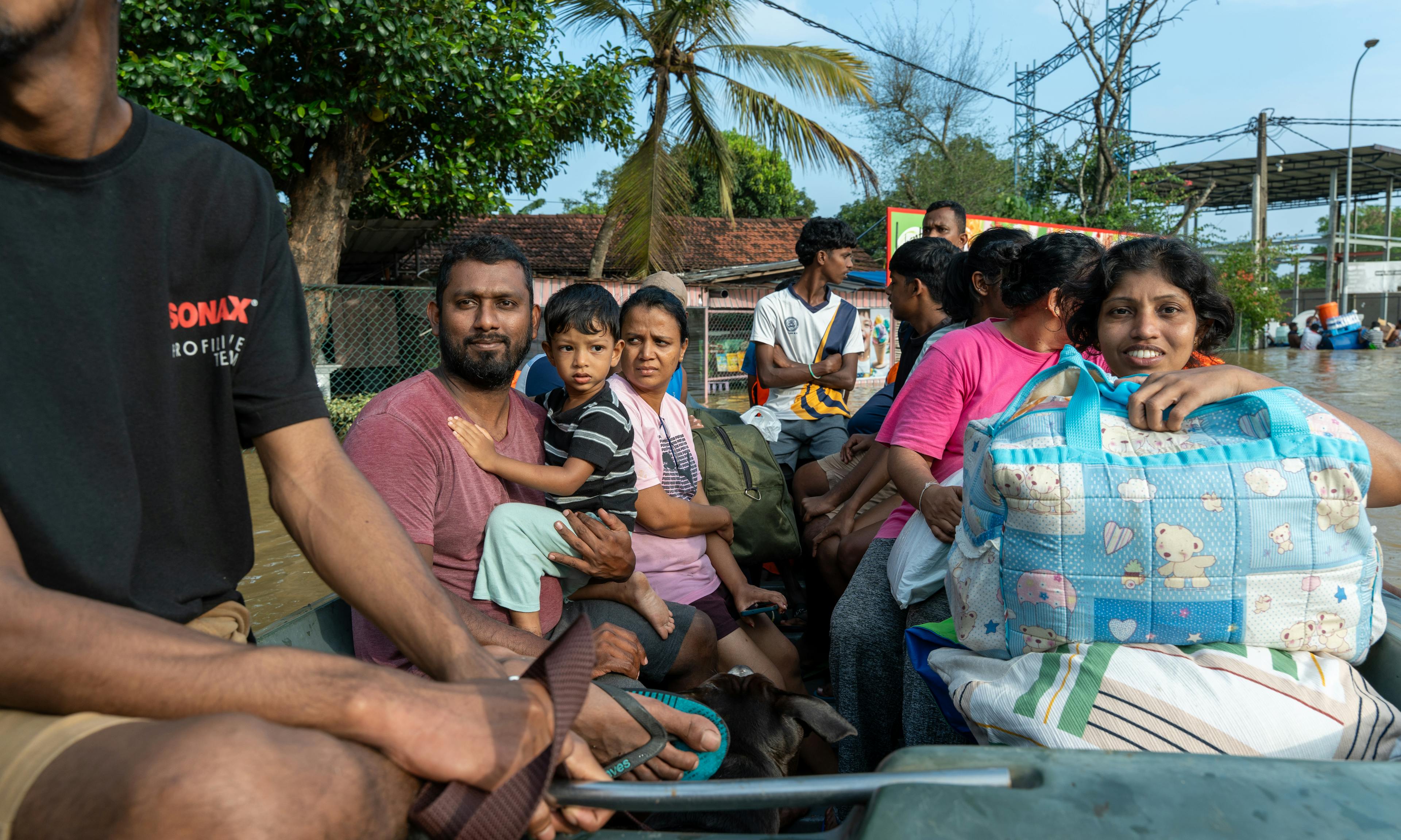 On 30th November 2025 in Kelaniya, Sri Lanka, Sri Lanka Army rescue boats transported villagers stranded near the Kelani River to safer locations.