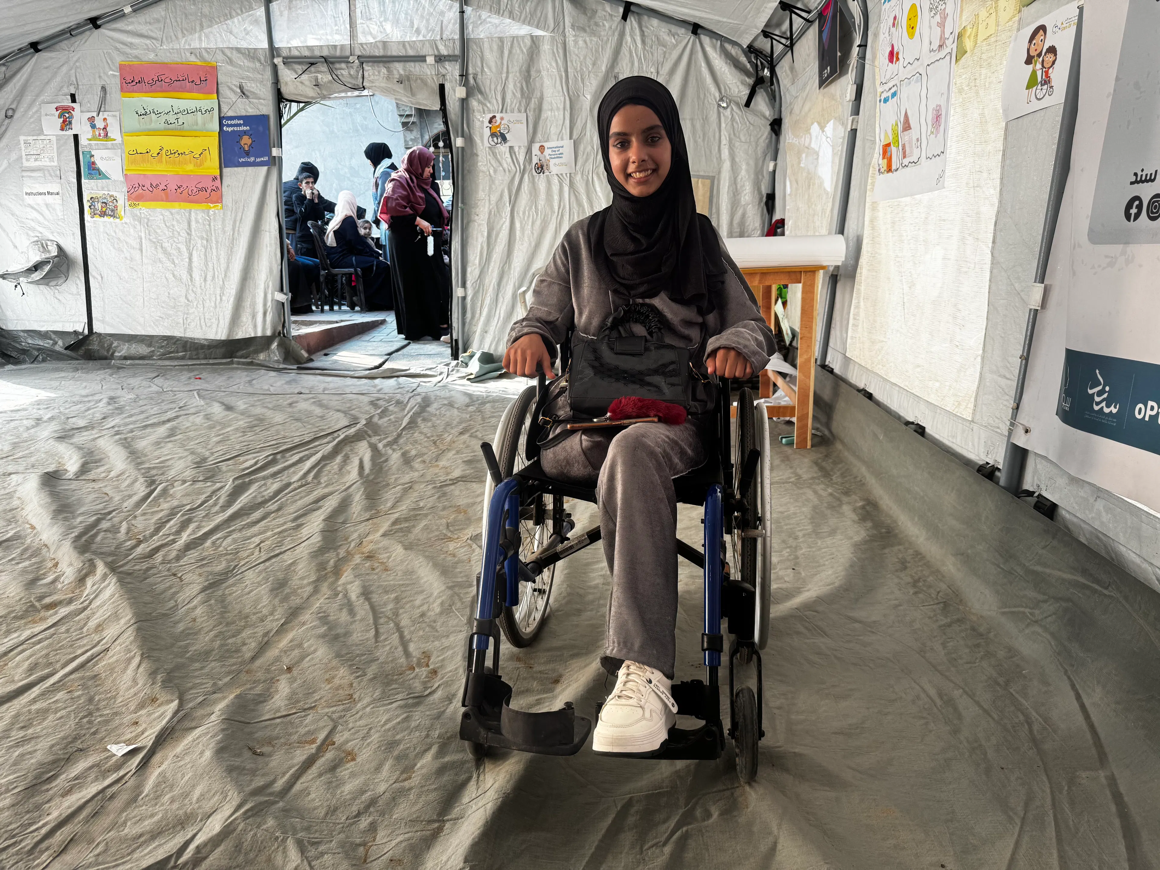 Amputee-child-in-Gaza-sits-in-a-wheelchair-in-an-emergency-tent-during-conflict-