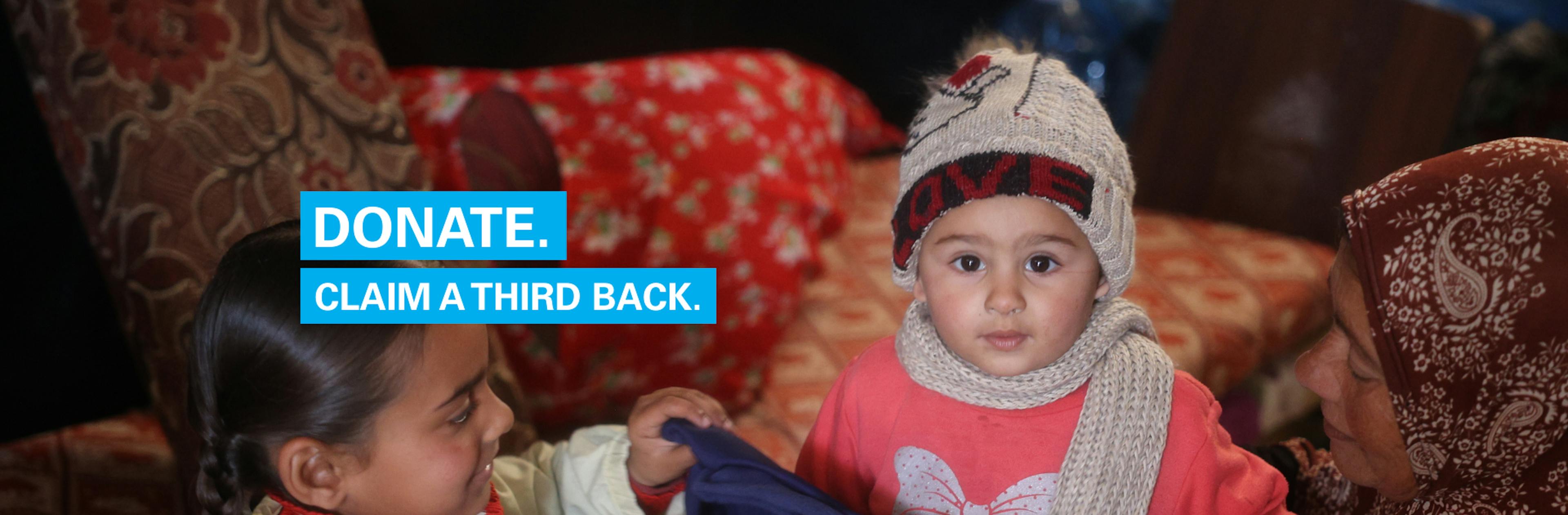 A child in Gaza receives warm winter clothes