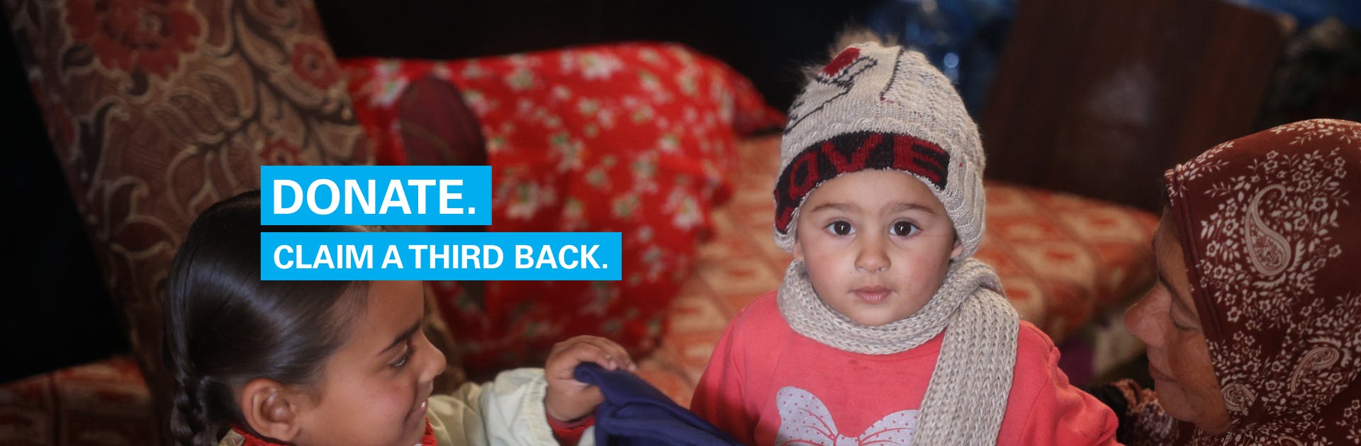 A child in Gaza receives warm winter clothes