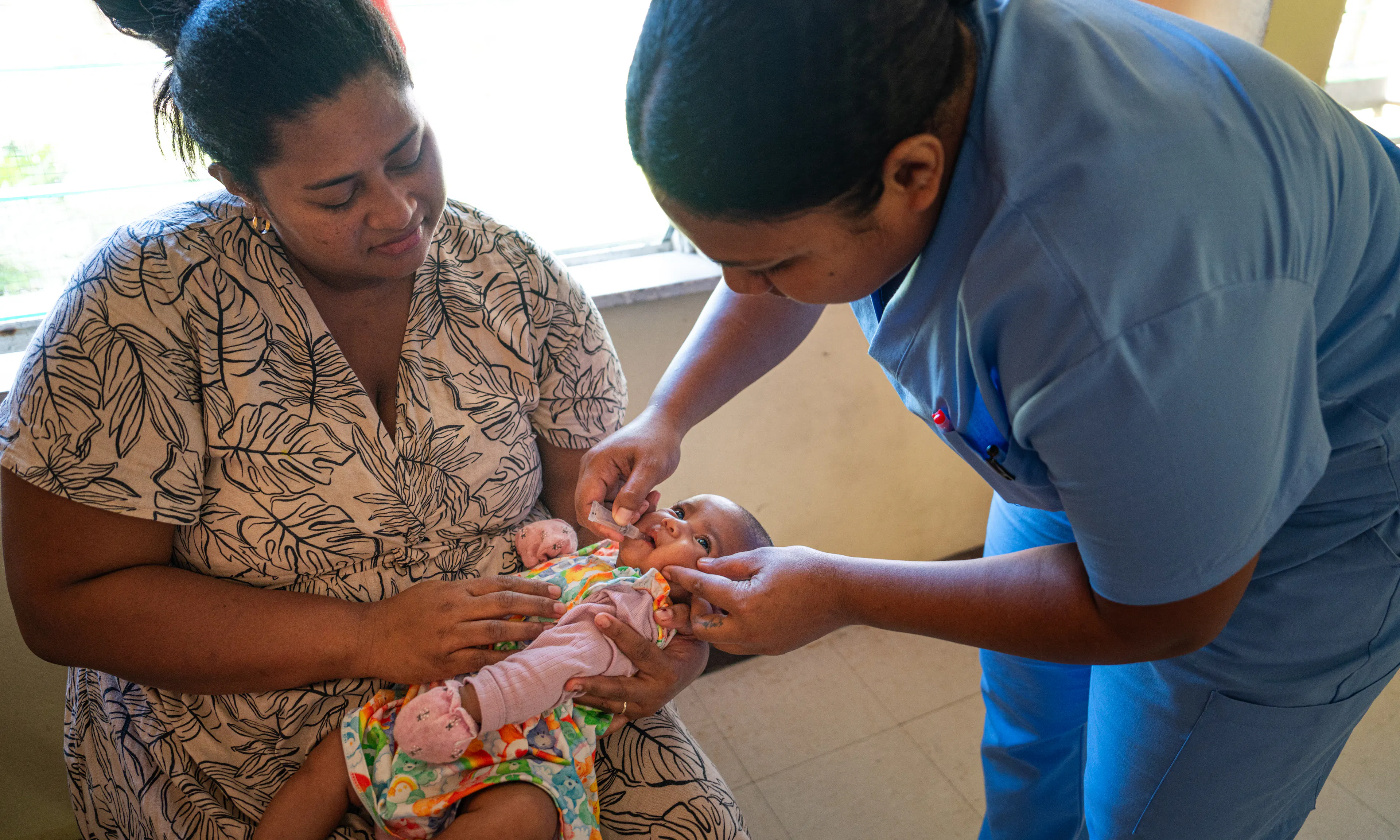 Charlene, 2 months old, receives a vaccination at the Maternal and Child Health center in Lami Health Clinic, Fiji.