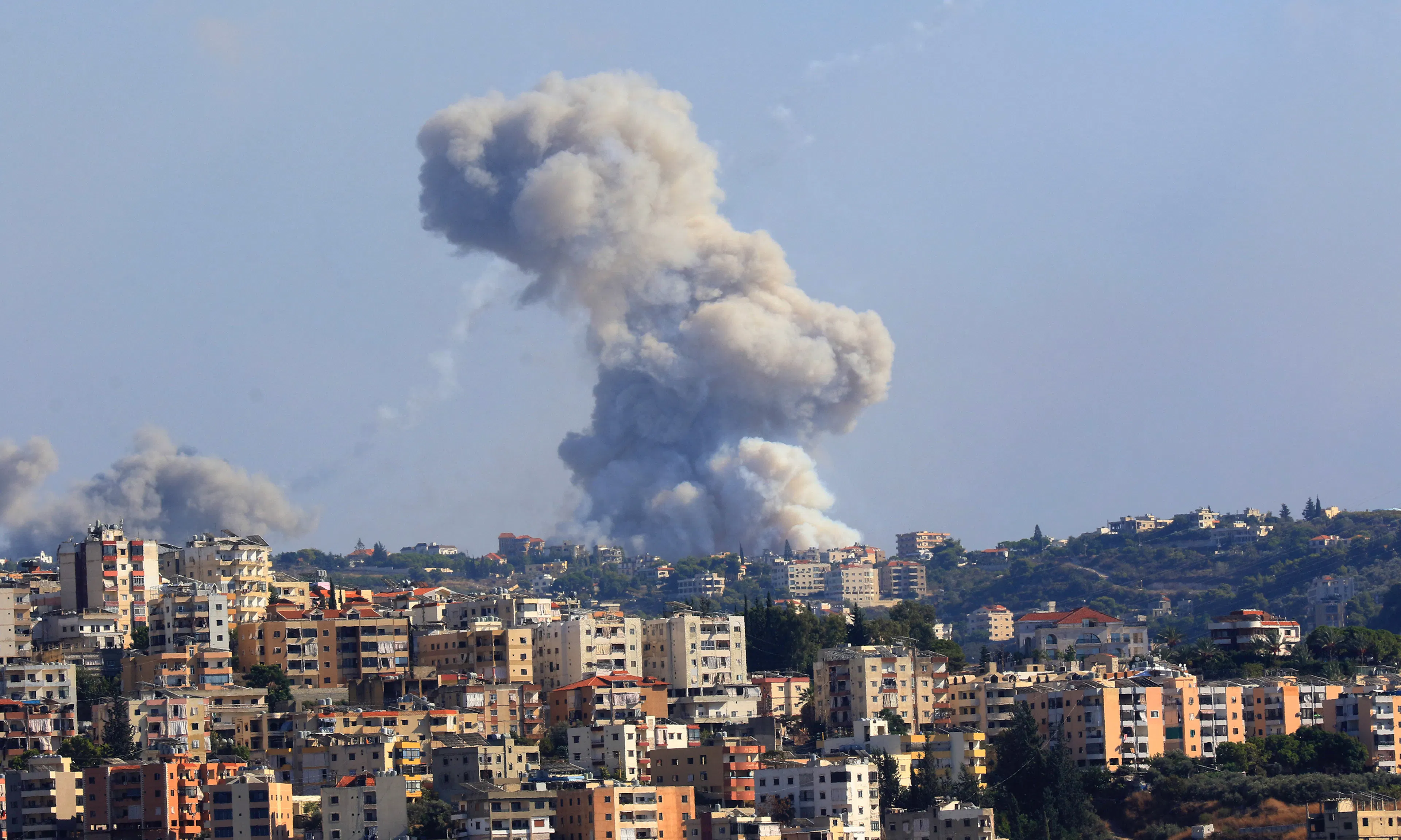 Smoke billows from a site targeted by shelling in the southern Lebanese village of Zaita
