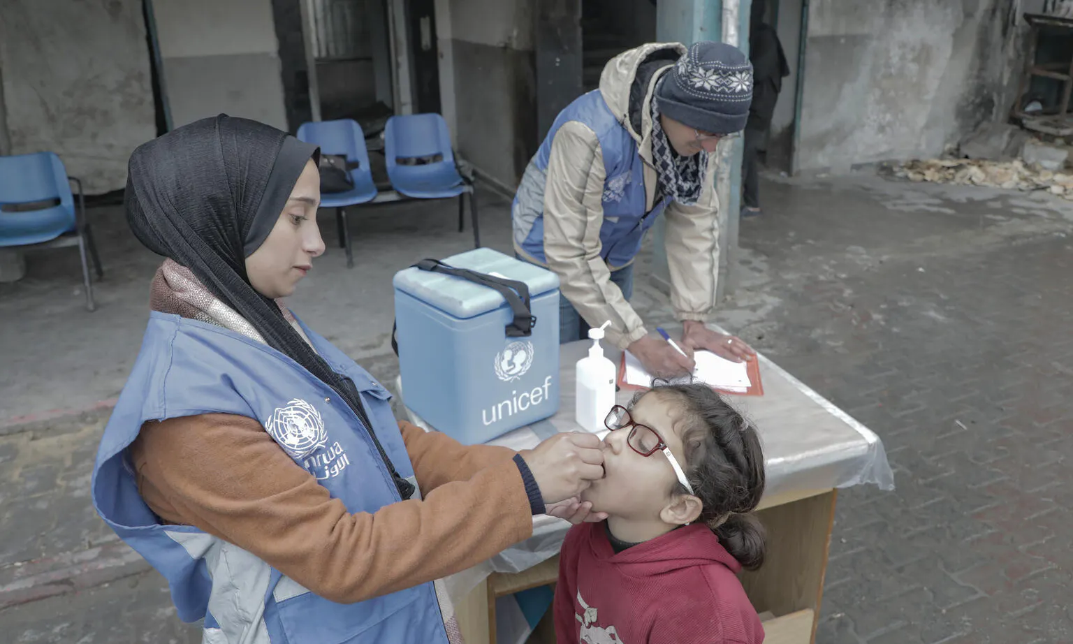 Children are receiving polio vaccines, at a school in Beach camp in Gaza city, as part of the vaccination campaign that is expected to run for the coming days.