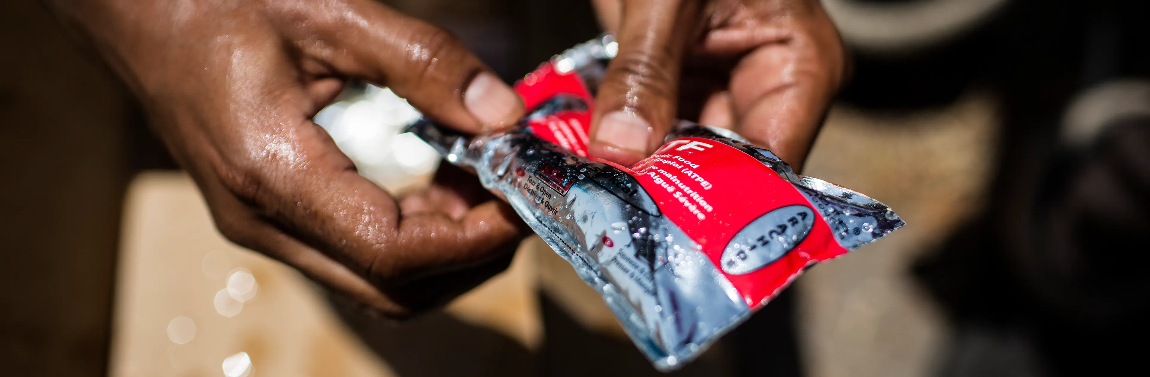 RUTF sachet with red label